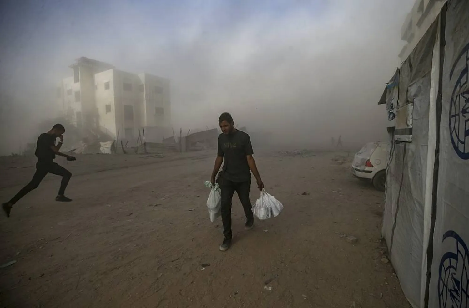 Smoke rises at the Al Harazin building following an air strike during an Israeli military operation in Gaza City, Gaza Strip, 03 October 2025. (EPA)