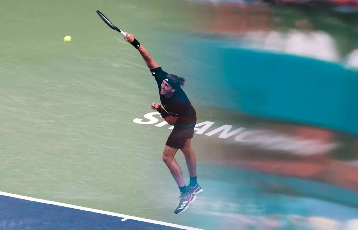 Alexander Zverev of Germany in action during his men's Singles match against Valentin Royer of France at the Shanghai Masters tennis tournament in Shanghai, China, 04 October 2025. (EPA)