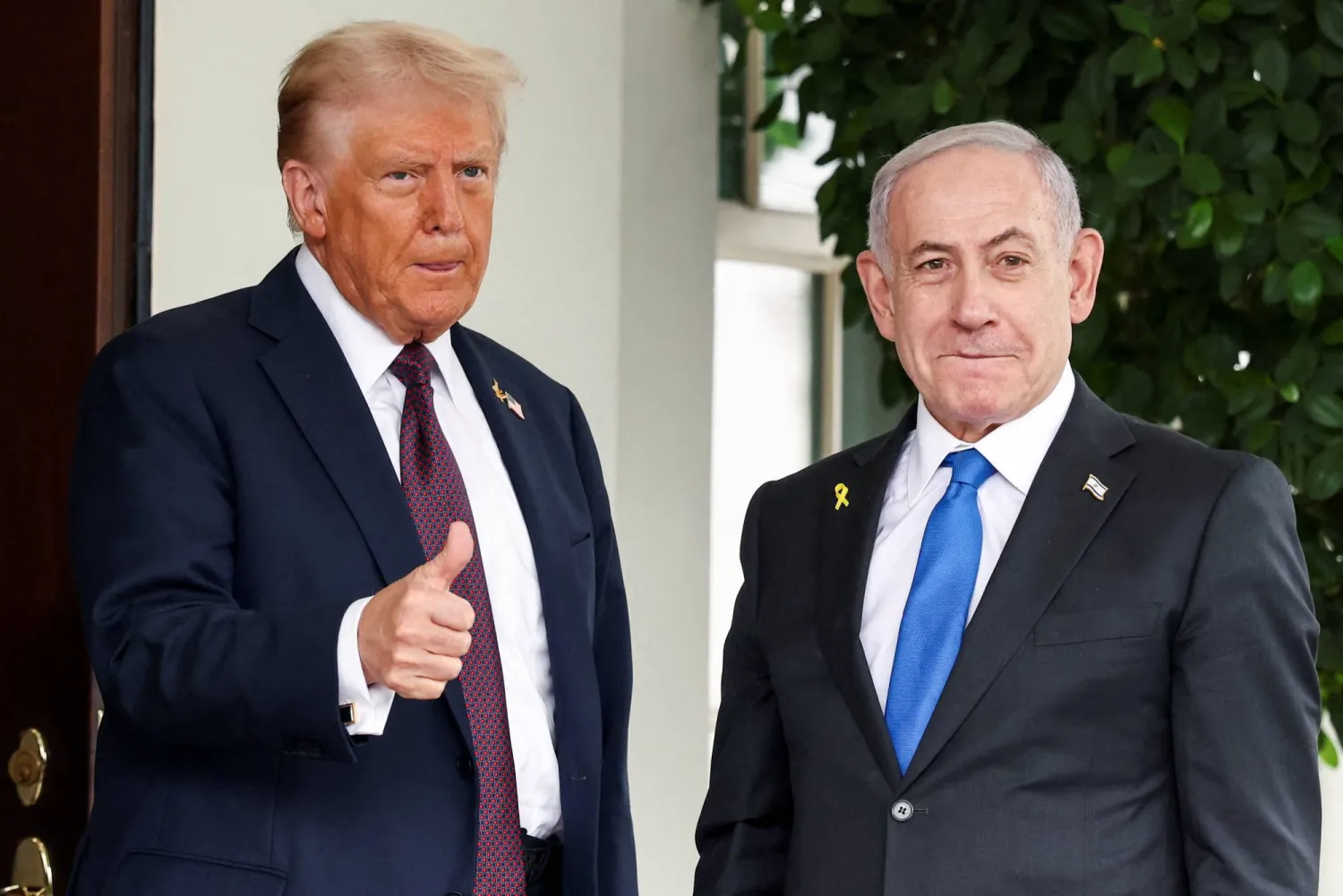 US President Donald Trump gives a thumbs up as he welcomes Israeli Prime Minister Benjamin Netanyahu at the White House in Washington, DC, US, September 29, 2025. (Reuters)