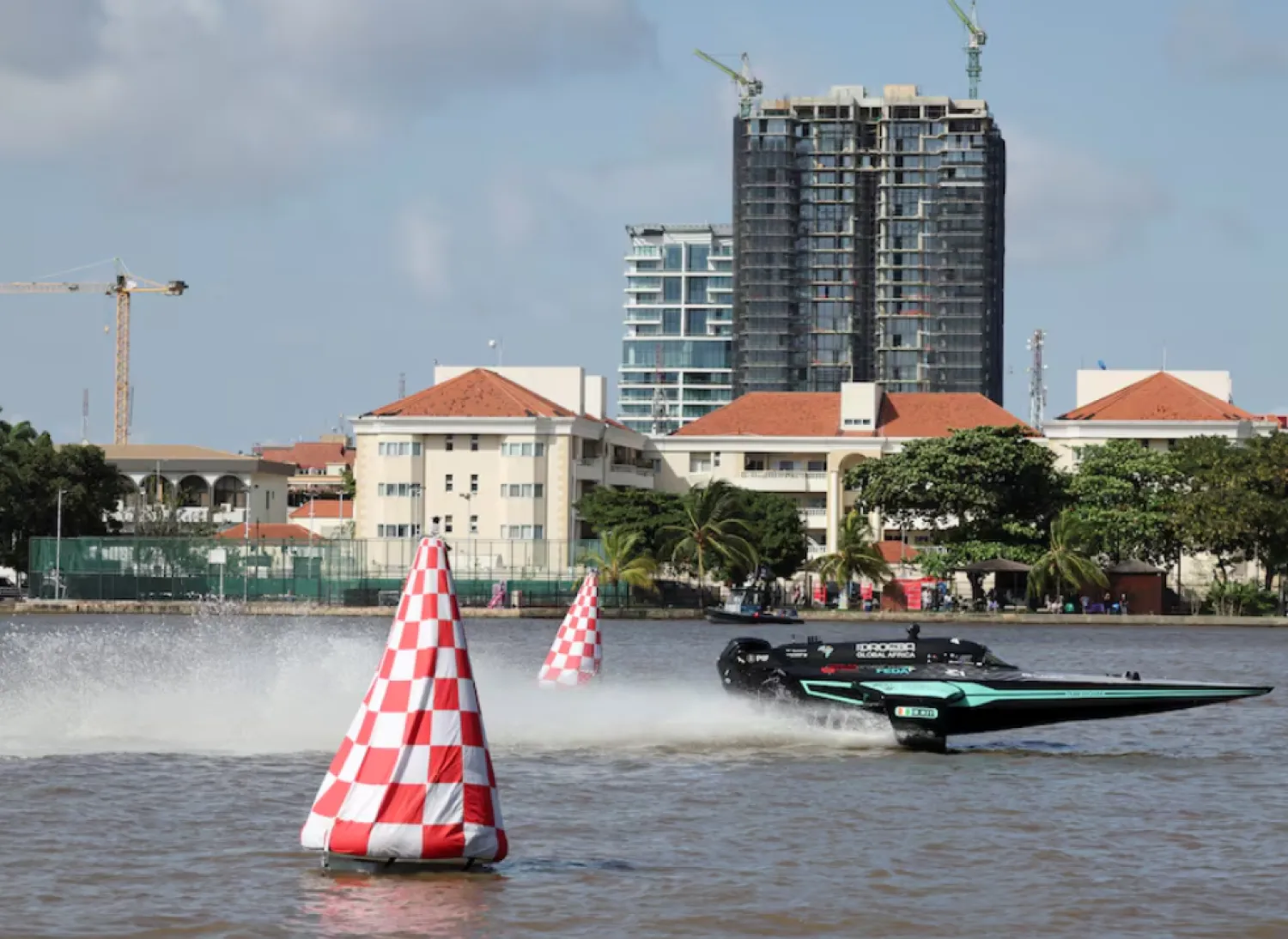 An E1 powerboat races across the Lagos lagoon during the qualifying time trial of the E1 Lagos GP powerboat championship debut in Lagos, Nigeria, October 4, 2025. REUTERS