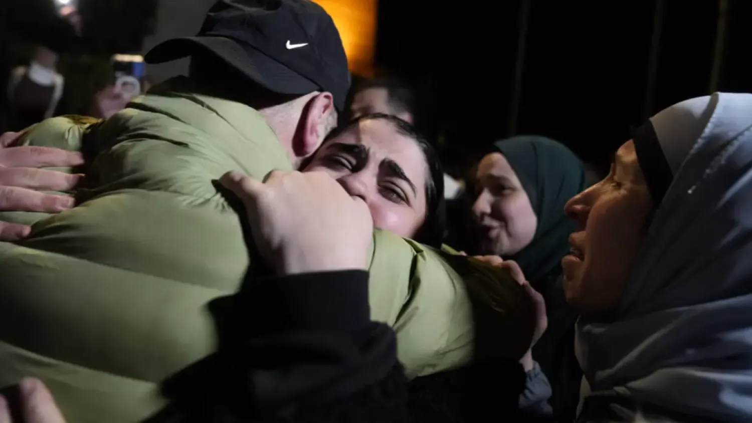Palestinian prisoners are greeted after being released from Israeli prison following a ceasefire agreement between Israel and Hamas, in the West Bank city of Ramallah on Thursday, February 27. © Nasser Nasser, AP
