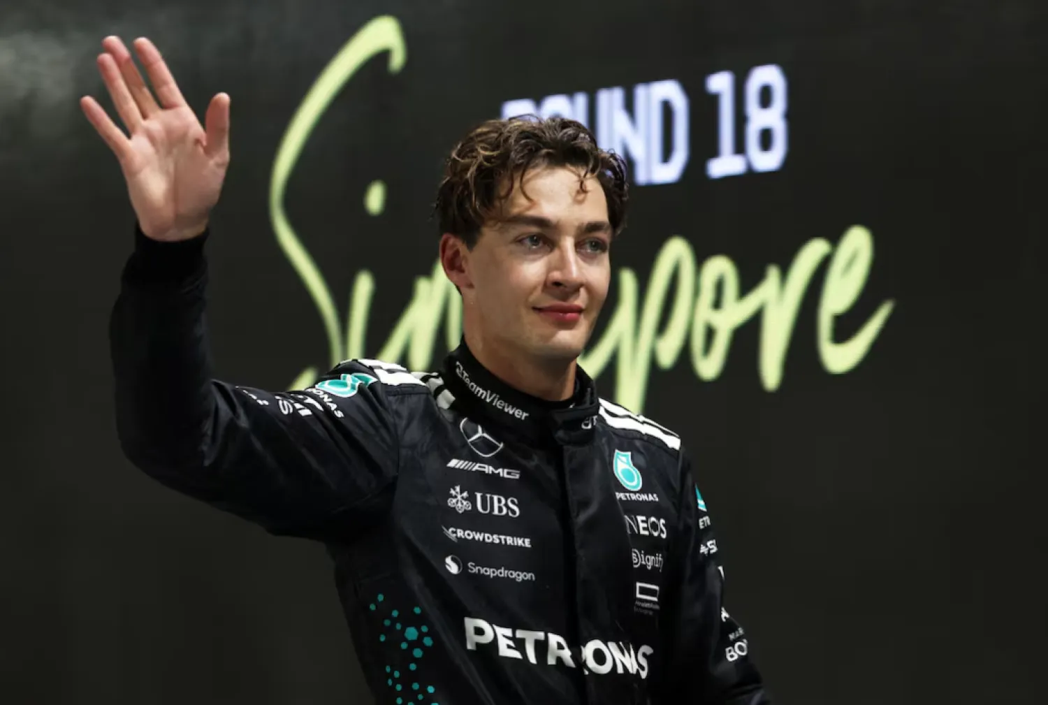 Formula One F1 - Singapore Grand Prix - Marina Bay Street Circuit, Singapore - October 4, 2025 Mercedes' George Russell celebrates after qualifying in pole position REUTERS