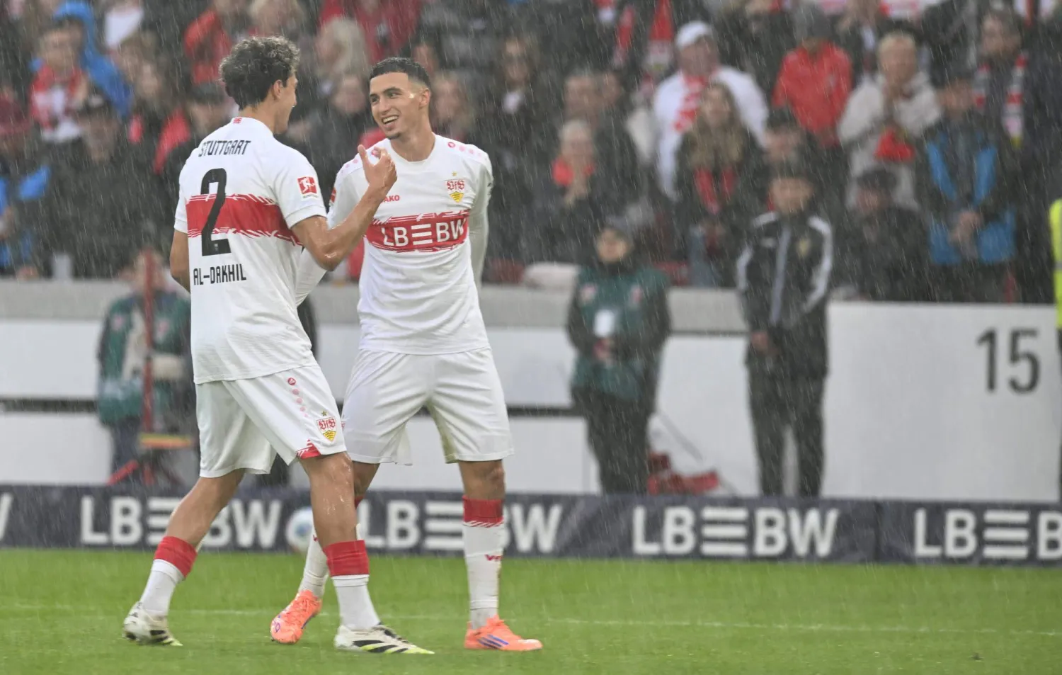 Stuttgart's German-Marrocan forward #11 Bilal El Khannouss (R) celebrates with Stuttgart's Belgian defender #02 Ameen Al-Dakhil scoring his team's first goal during the German first division Bundesliga football match VfB Stuttgart v 1 FC Heidenheim in Stuttgart, southwestern Germany on October 5, 2025. (Photo by THOMAS KIENZLE / AFP) 