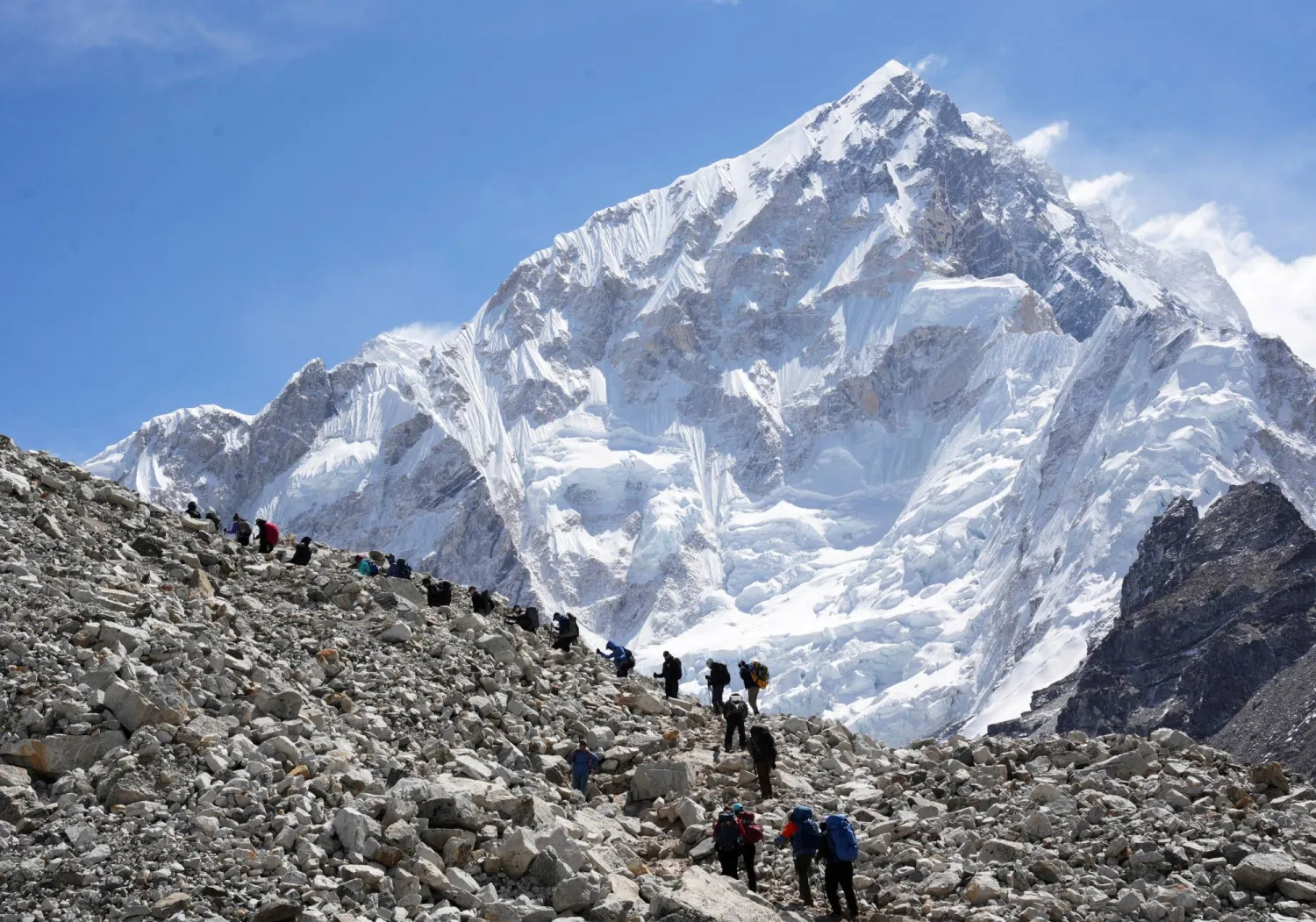 FILE PHOTO: Mountaineers and trekkers head towards the Everest base camp from Lobuche in the Solukhumbu district, also known as the Everest region, Nepal April 12, 2025. REUTERS/Purnima Shrestha/File Photo