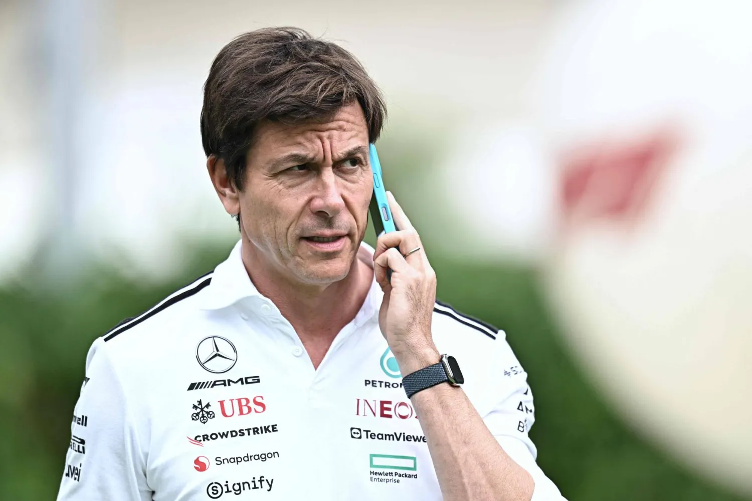 Mercedes' Austrian team principal and CEO Toto Wolff arrives at the paddock on the raceday of the Formula One Singapore Grand Prix night race at the Marina Bay Street Circuit in Singapore on October 5, 2025. (AFP) 
