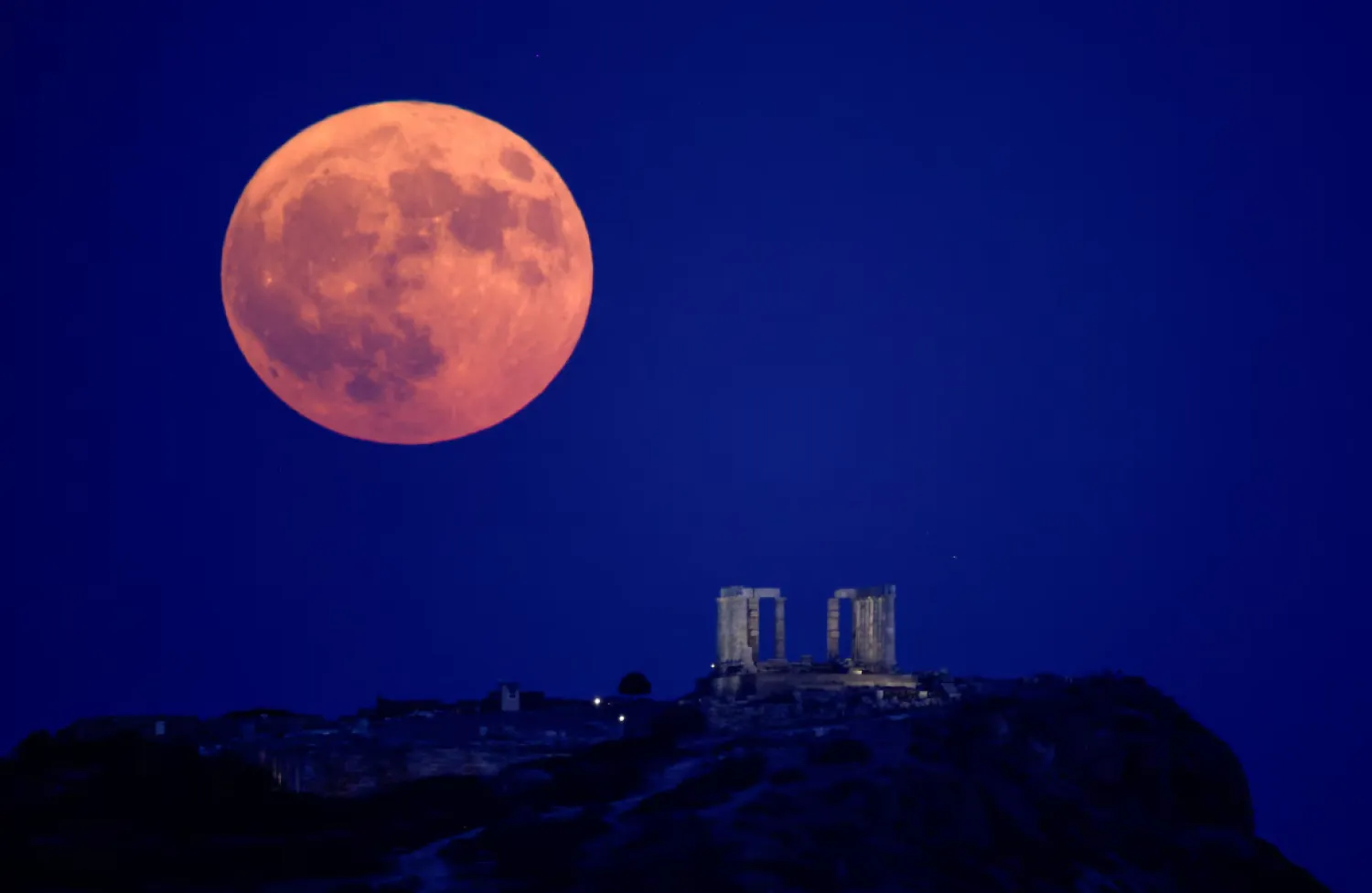 The moon will take on its familiar silvery-white color and remain brightly illuminated throughout the night until sunrise on Tuesday - (File photo / Reuters)