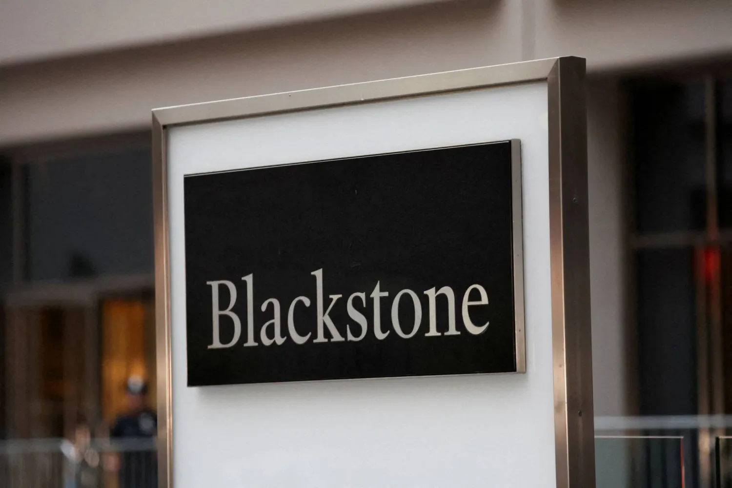 FILE PHOTO: A logo of Blackstone is pictured in Manhattan, New York City, US July 29, 2025. REUTERS/Mike Segar/File Photo