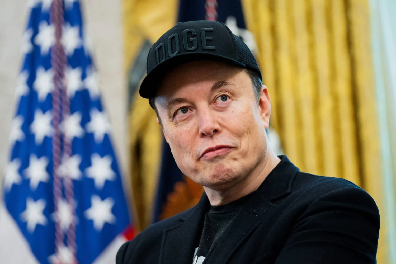(FILES) Elon Musk looks on during a news conference with US President Donald Trump in the Oval Office of the White House in Washington, DC, on May 30, 2025. Photo by Allison ROBBERT / AFP)