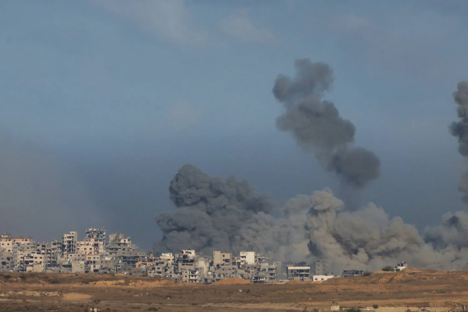 Plumes of smoke rise from explosions in Gaza, as seen from southern Israel, October 7, 2025. (Reuters)