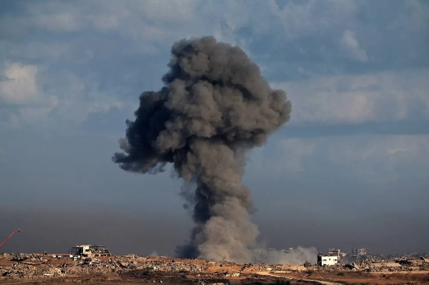Smoke rises as a result of an Israeli strike on the outskirts of Gaza City as seen from the Israeli side of the border, 07 October 2025. (EPA)