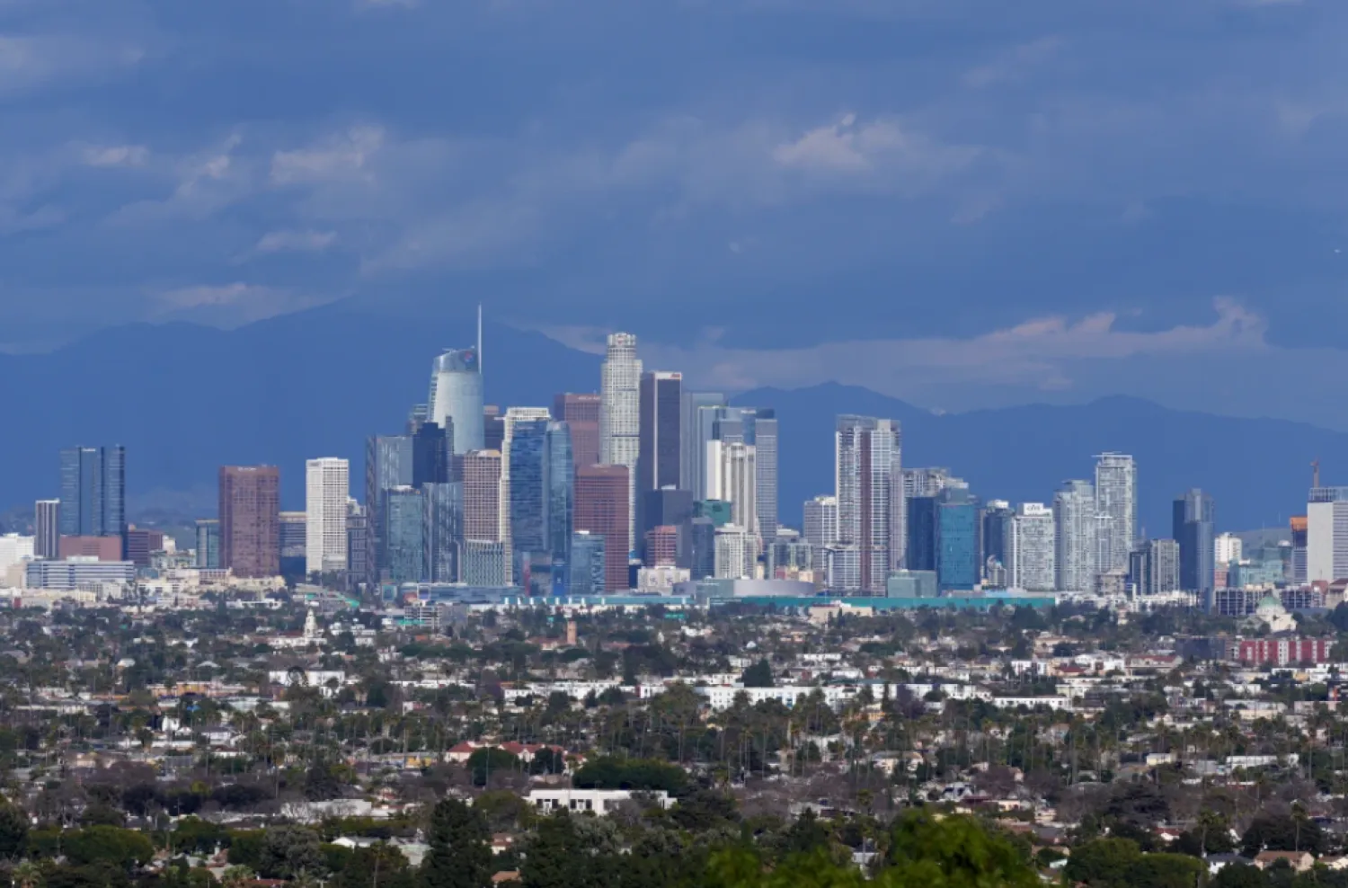 The Los Angeles skyline is seen from a Baldwin Hills overlook, Feb. 9, 2024. (AP Photo/Damian Dovarganes, File)

