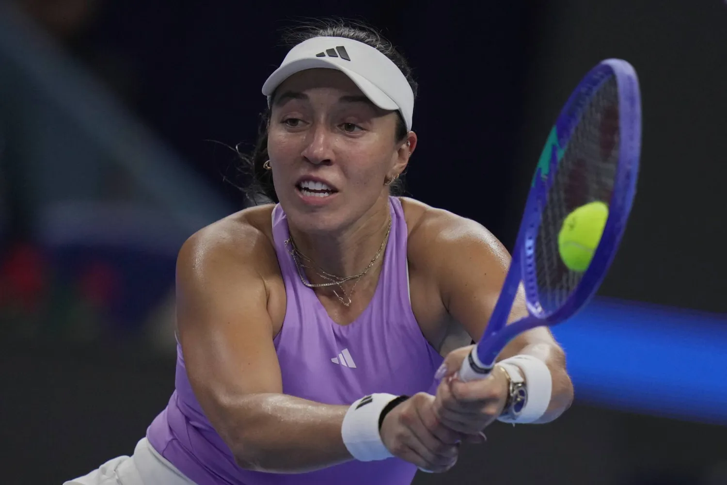 Jessica Pegula, of the United States returns a backhand shot from Linda Noskova, of the Czech Republic during the women's singles semifinals match of the China Open tennis tournament, at the National Tennis Center, in Beijing, Saturday, Oct. 4, 2025. (AP Photo/Andy Wong)