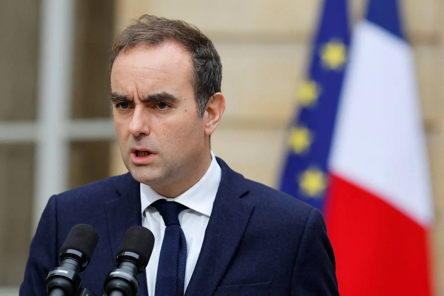 French outgoing Prime Minister Sebastien Lecornu gives a statement on the sidelines of his talks with political parties' leaders in a bid to form a coalition government, able to pass an austerity budget through parliament, at the Hotel Matignon in Paris on October 8, 2025. (AFP)