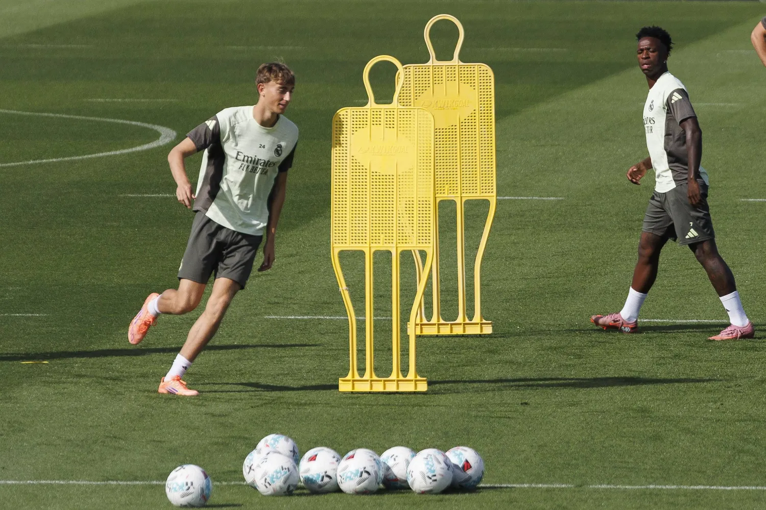 Real Madrid's Vinicius Jr. (L) and Dean Huijsen participate in a training session of the team in Madrid, Spain, 03 October 2025. Real Madrid face Villarreal in a LaLiga soccer match on 04 October. (EPA)