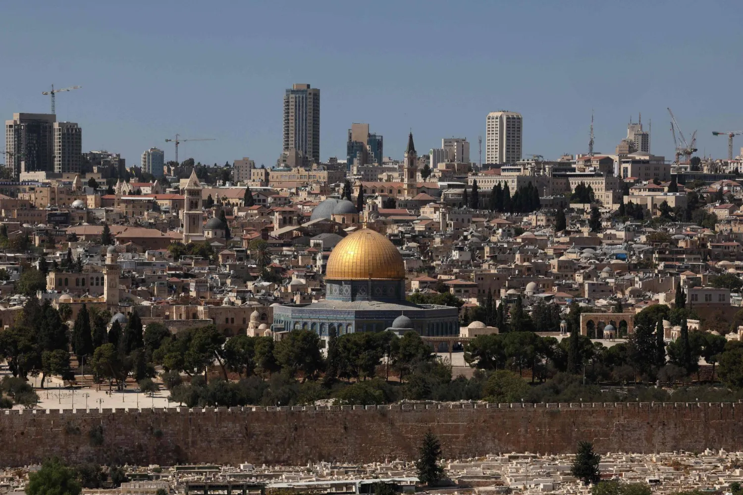  This picture taken from Mount of Olives shows the Dome of the Rock mosque at the Al-Aqsa Mosque compound in Jerusalem's Old City and and the city's high-rises in the background, on October 8, 2025. (AFP)