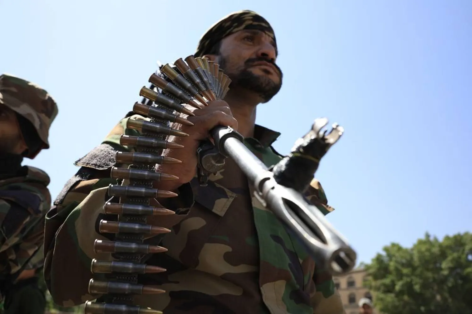 A Houthi fighter wears a machine gun bullet belt during a rally marking the second anniversary of the 07 October attacks carried by Hamas against Israel, in Sanaa, Yemen, 07 October 2025. (EPA)