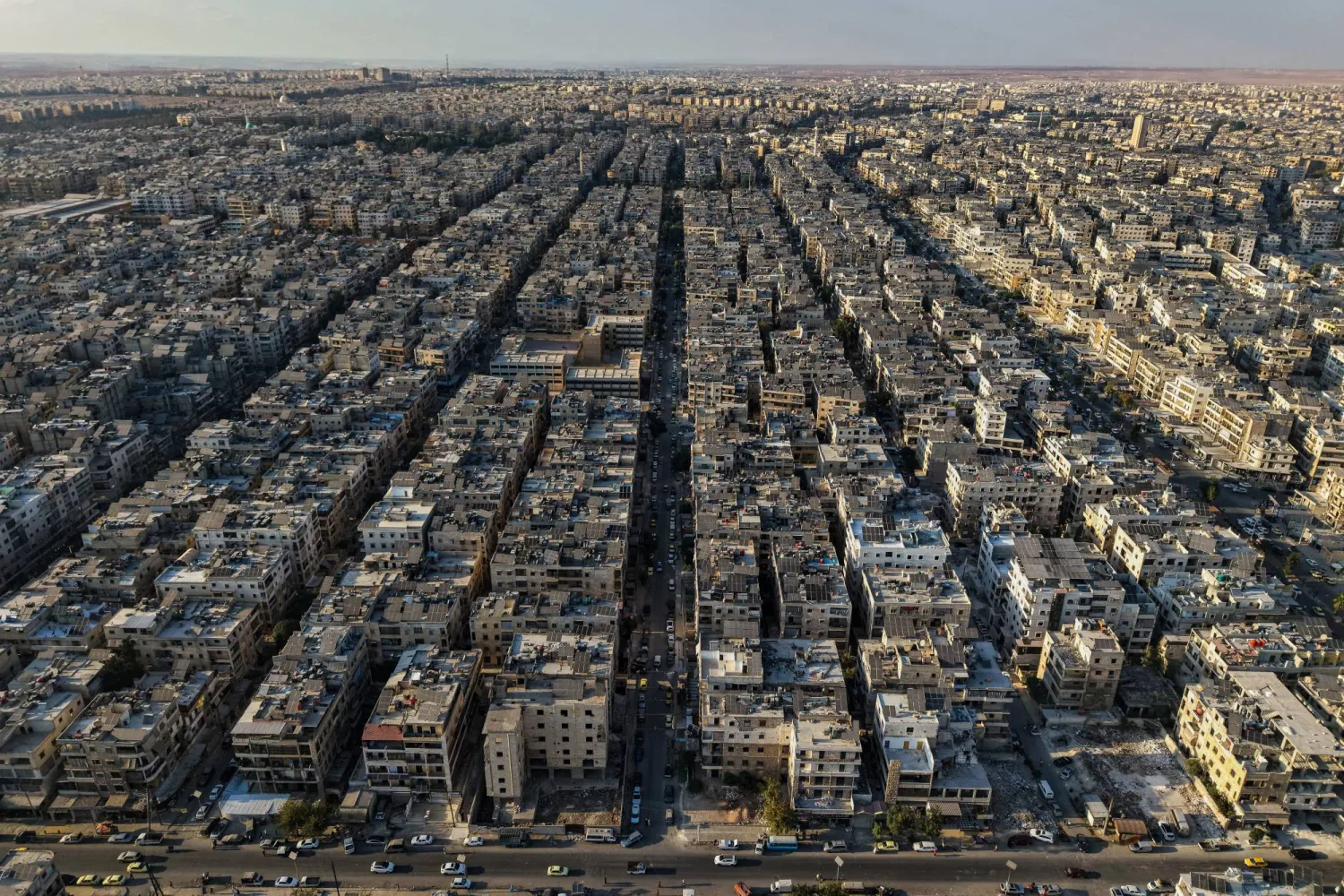 A general view shows the Sheikh Maqsoud neighborhood of Aleppo, Syria, Tuesday, Oct. 7, 2025. (AP Photo/Omar Albam)