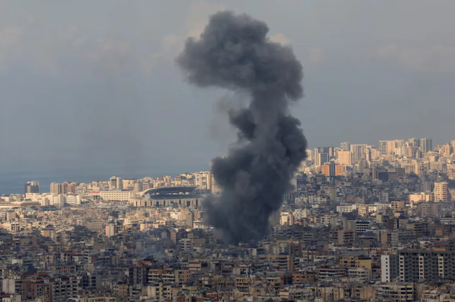 Smoke billows over Beirut's southern suburbs after an Israeli strike, amid the ongoing hostilities between Hezbollah and Israeli forces, as seen from Baabda, Lebanon November 13, 2024. REUTERS/Thaier Al-Sudani 