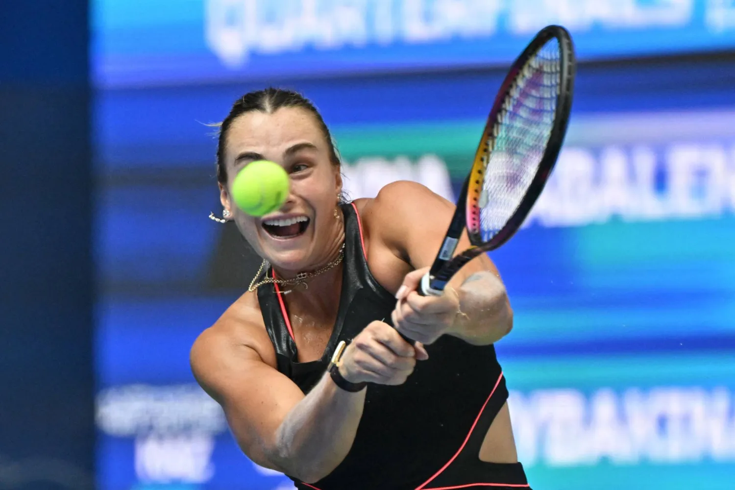 Belarus’ Aryna Sabalenka hits a return to Kazakhstan's Elena Rybakina during their women’s singles quarter-final match at the Wuhan Open tennis tournament in Wuhan, Central China’s Hubei province on October 10, 2025. (AFP)