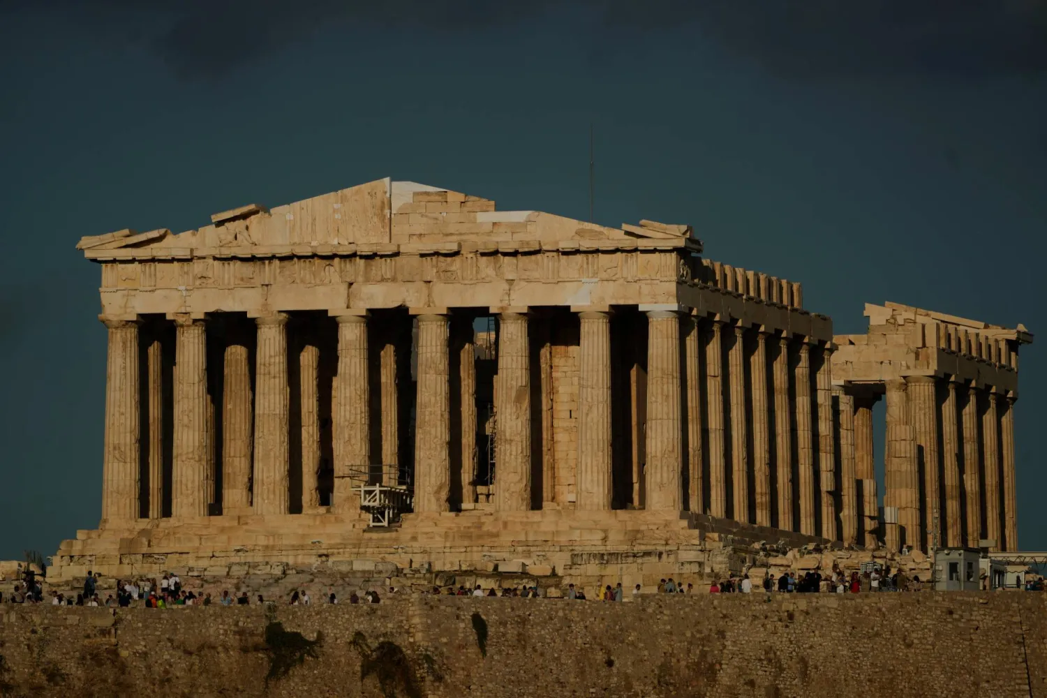 The 5th century B.C. Parthenon temple stands free of scaffolding on the Acropolis hill in Athens, Friday, Oct. 10, 2025, after the removal of restoration structures that had covered parts of the ancient monument for decades.(AP Photo/Petros Giannakouris)