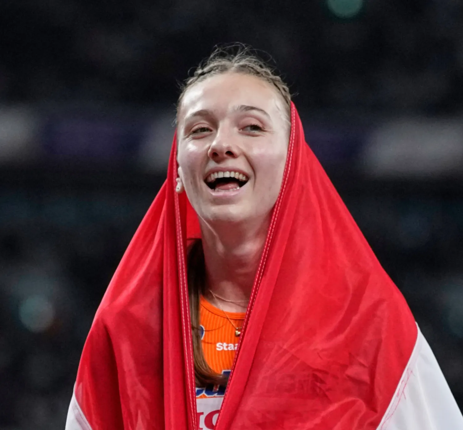 

FILE -Netherlands' Femke Bol celebrates winning the gold medal in the women's 400 meters hurdles final at the World Athletics Championships in Tokyo, Sept. 19, 2025. (AP Photo/Petr David Josek, File)


