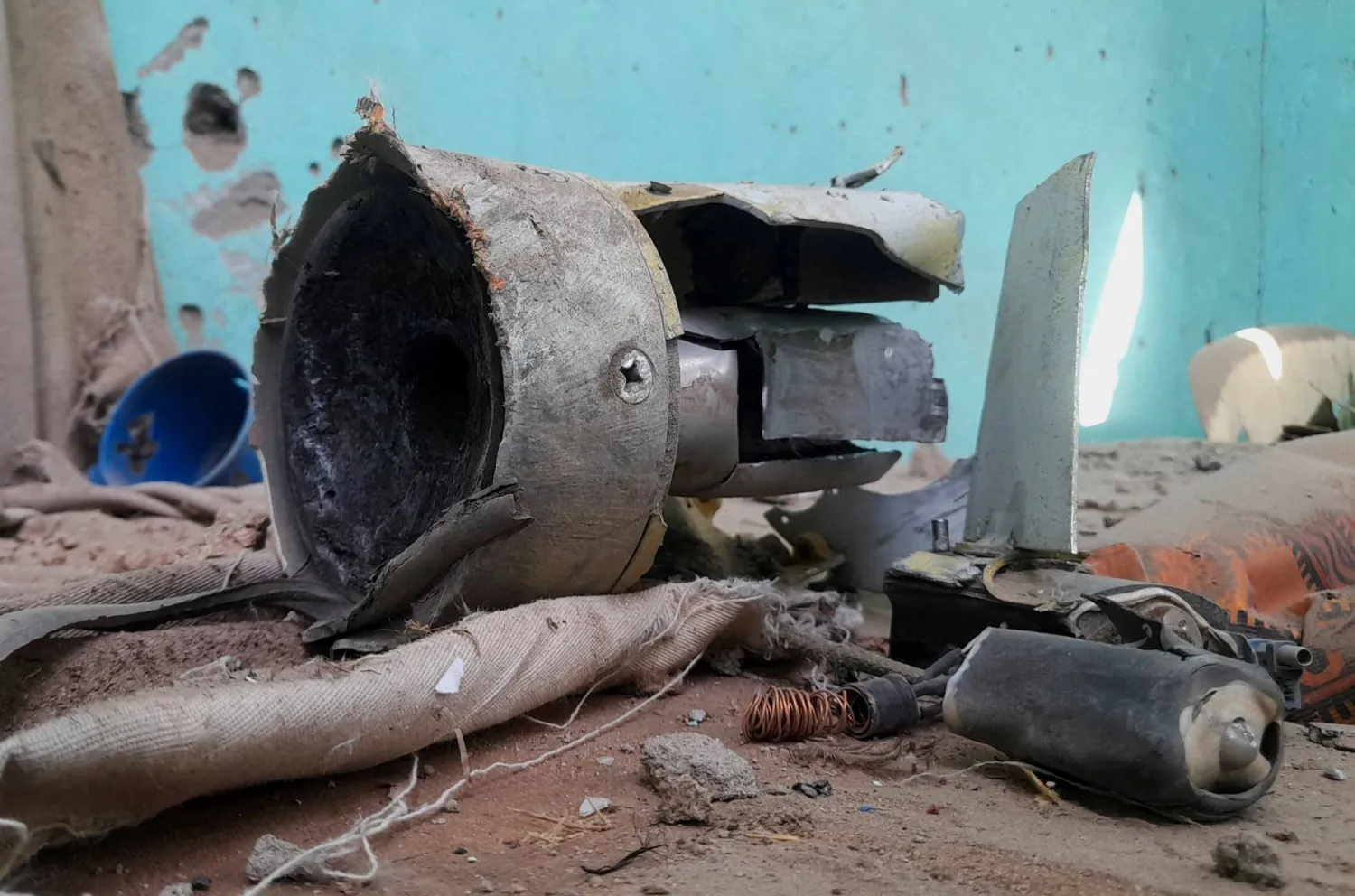 Remnants of a shell that targeted the refugee center, in El Fasher, Sudan, October 7, 2025. REUTERS/Mohyaldeen M Abdallah