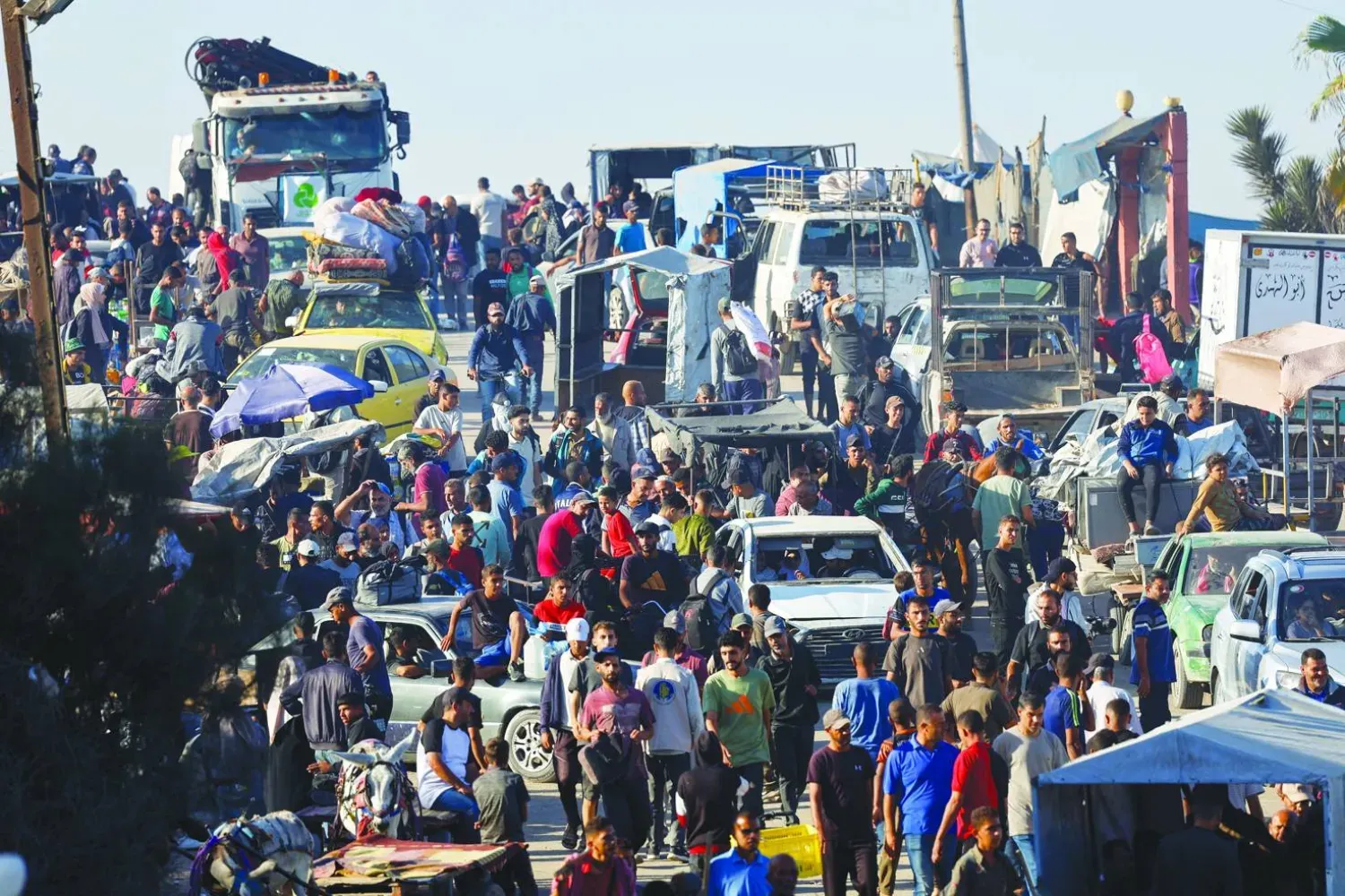 Gazze'deki Filistin Sivil Savunma Teşkilatı dün, yarım milyondan fazla Filistinlinin Gazze şehrine geri döndüğünü açıkladı (Reuters)