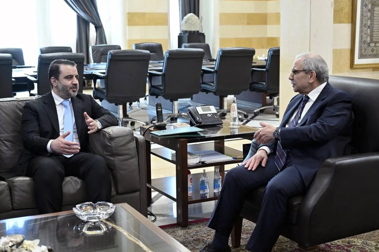 Lebanese Prime Minister Nawaf Salam (R) meets with Syrian Minister of Foreign Affairs Asaad al-Shaibani (L) at the Government Palace in Beirut, Lebanon, 10 October 2025. (EPA)