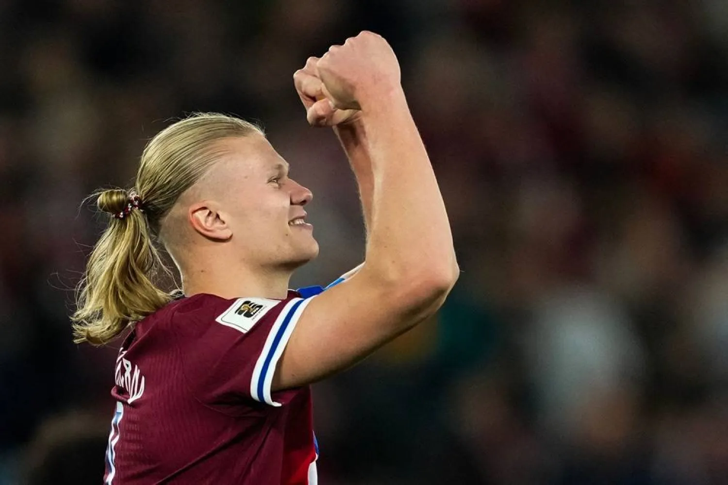 Norway's forward #09 Erling Haaland (L) celebrates scoring his second goal the 4-0 during the 2026 World Cup qualifiers Europe zone group I football match between Norway and Israel on October 11, 2025 in Oslo, Norway. (Fredrik Varfjell / NTB / AFP)