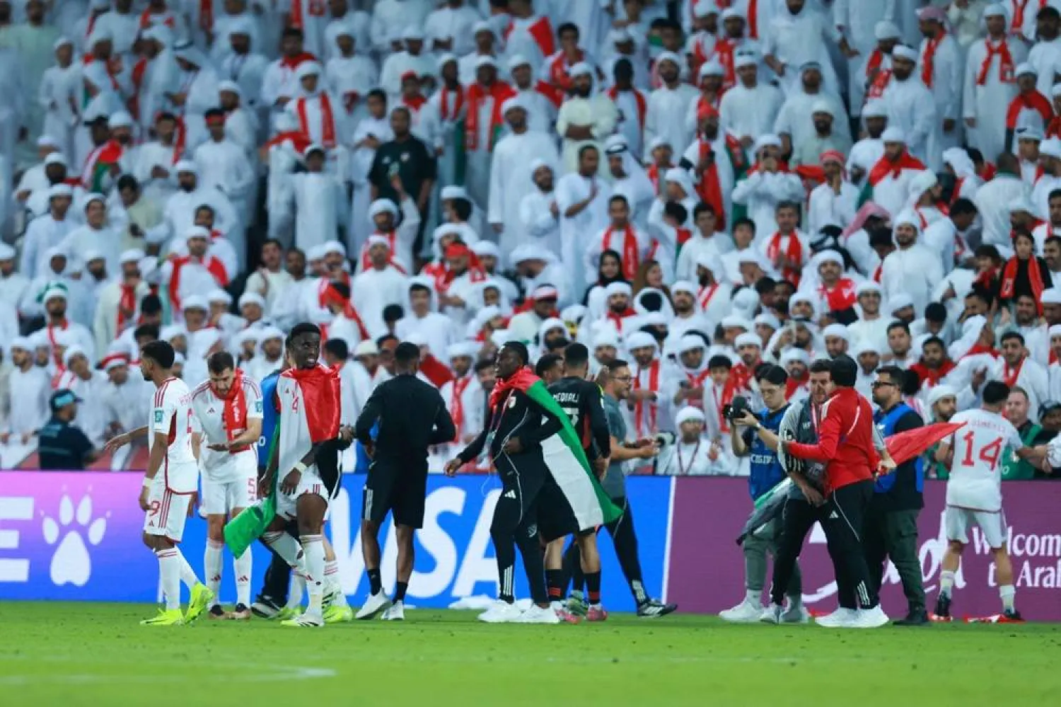  UAE players celebrate their win at the end of the FIFA World Cup 2026 Asian qualifier football match between United Arab Emirates and Oman at Jassim Bin Hamad Stadium in Doha on October 11, 2025. (AFP) 