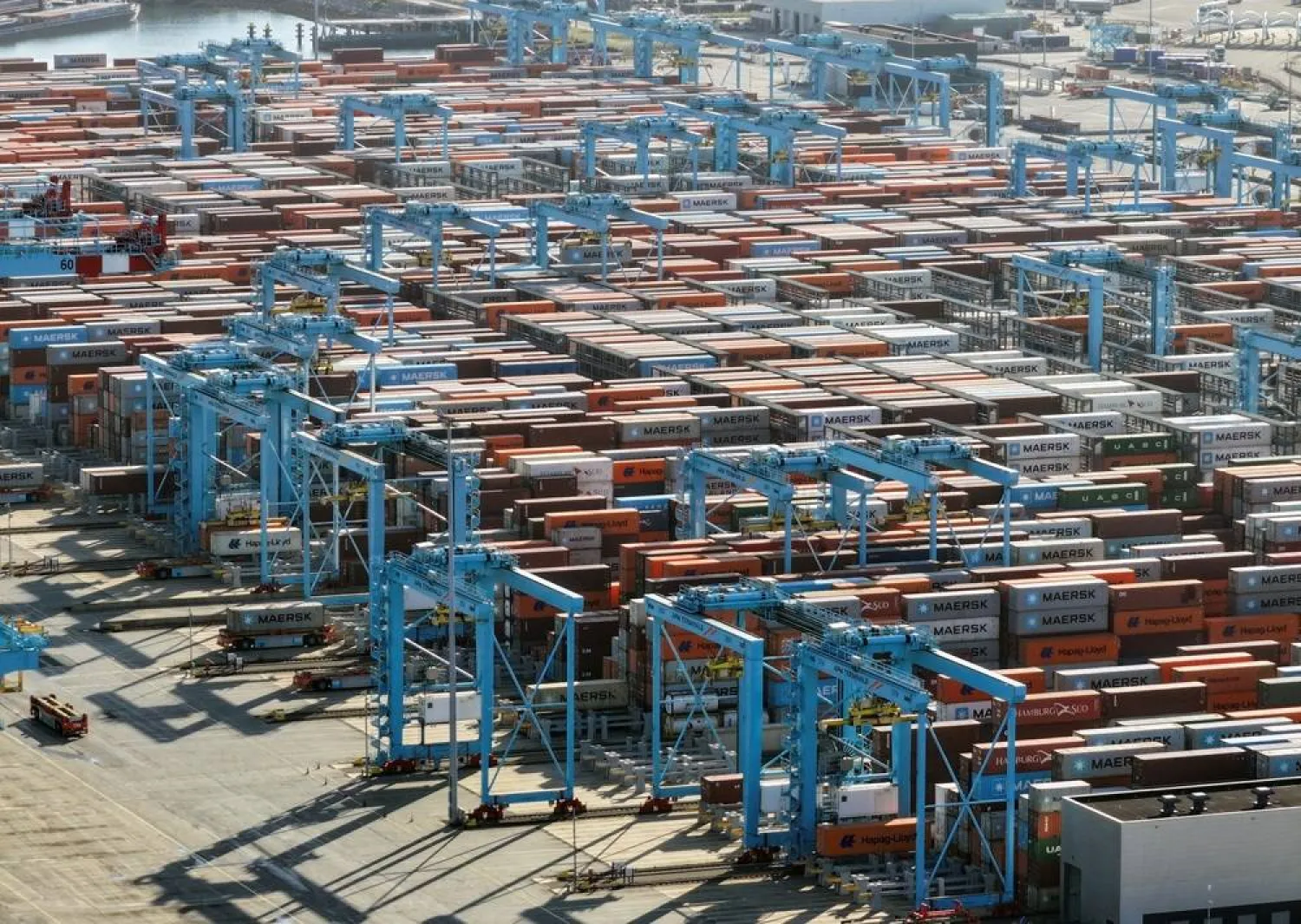 A drone view shows containers stacked at the port of Rotterdam in Rotterdam, Netherlands, July 9, 2025. (Reuters)