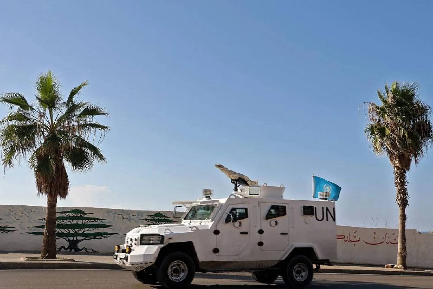 A UNIFIL armored vehicle drives through Beirut as part of a UN peacekeeping convoy heading towards south Lebanon, on November 12, 2024. (AFP)