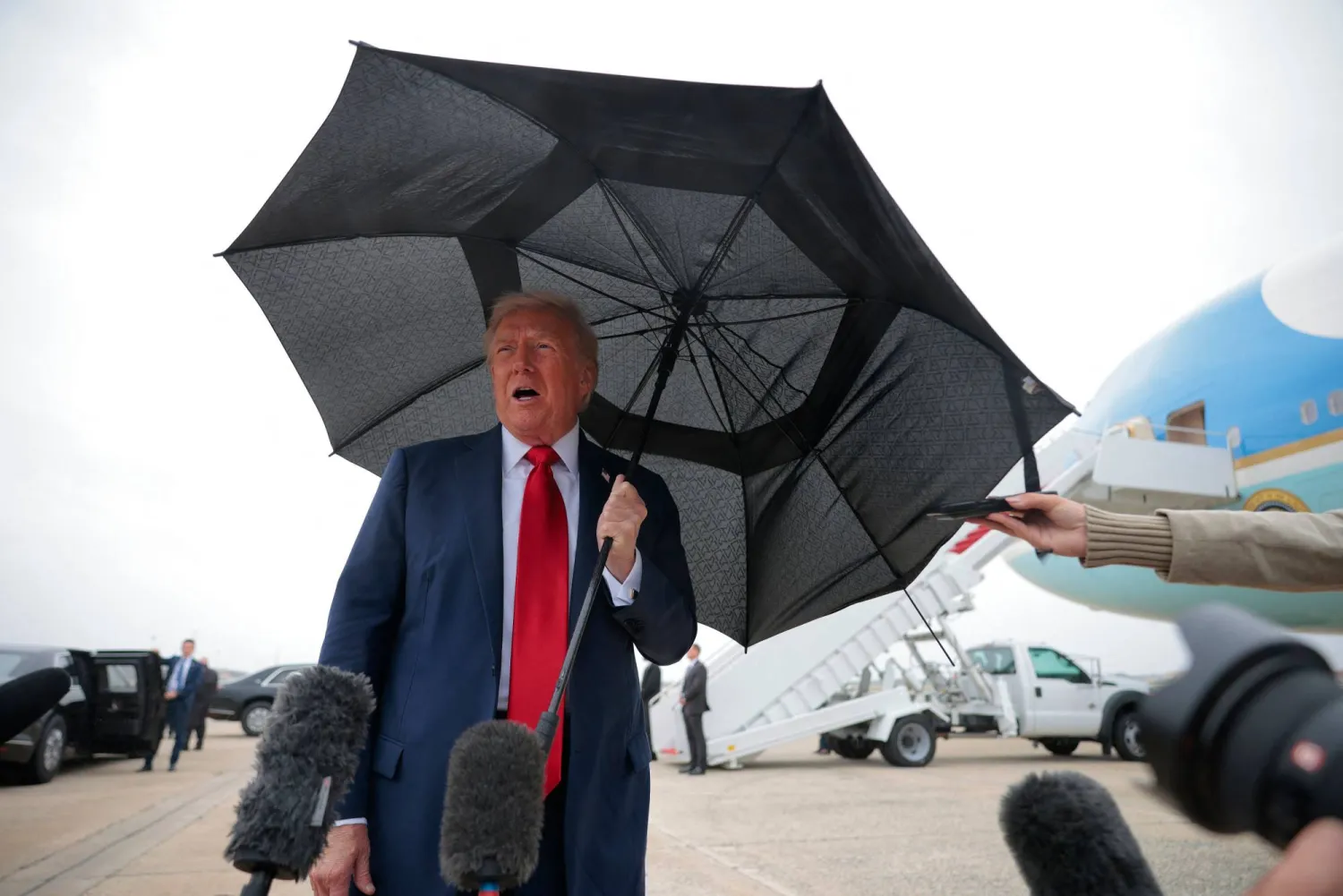 JOINT BASE ANDREWS, MARYLAND - OCTOBER 12: US President Donald Trump speaks to the press before boarding Air Force One for a trip to the Middle East on October 12, 2025 at Joint Base Andrews, Maryland. Chip Somodevilla/Getty Images/AFP 