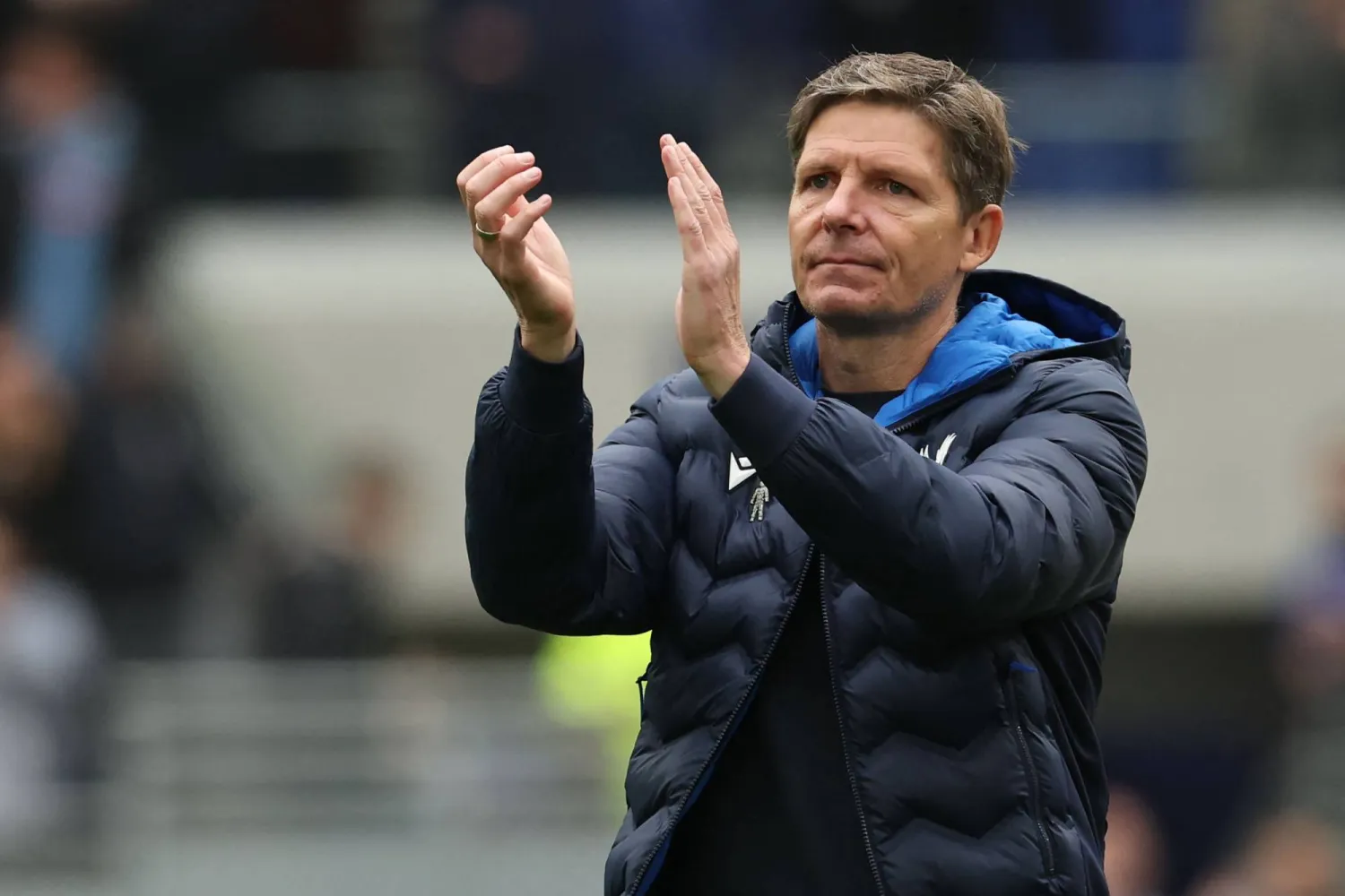 Crystal Palace's Austrian manager Oliver Glasner applauds fans on the pitch after the English Premier League football match between Everton and Crystal Palace at Hill Dickinson Stadium in Liverpool, north west England on October 5, 2025. (AFP)