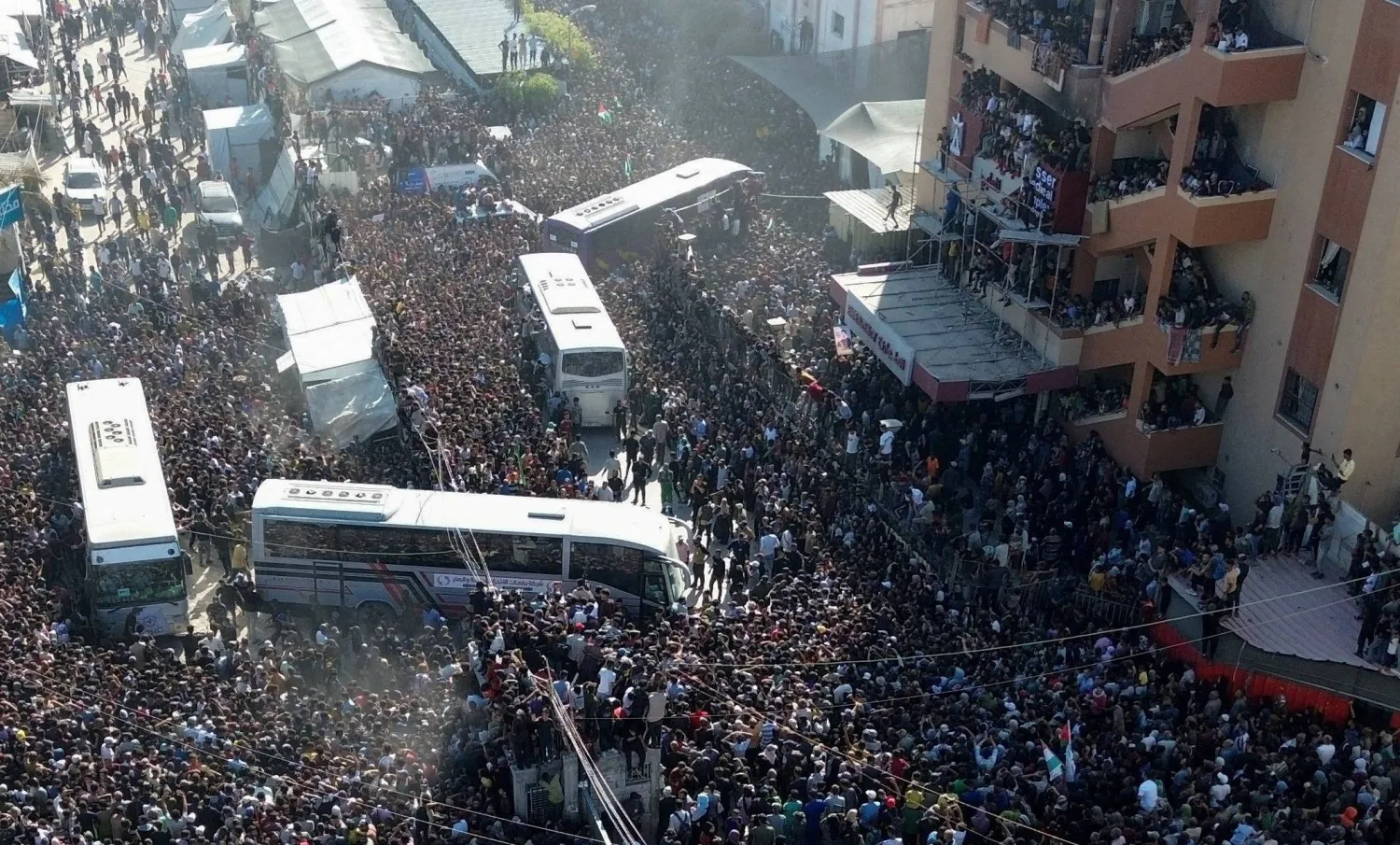 A drone view shows people gathering at Nasser hospital as they welcome freed Palestinian prisoners released by Israel as part of a hostages-prisoners swap and a ceasefire deal between Hamas and Israel, in Khan Younis in the southern Gaza Strip, October 13, 2025. REUTERS/Stringer     