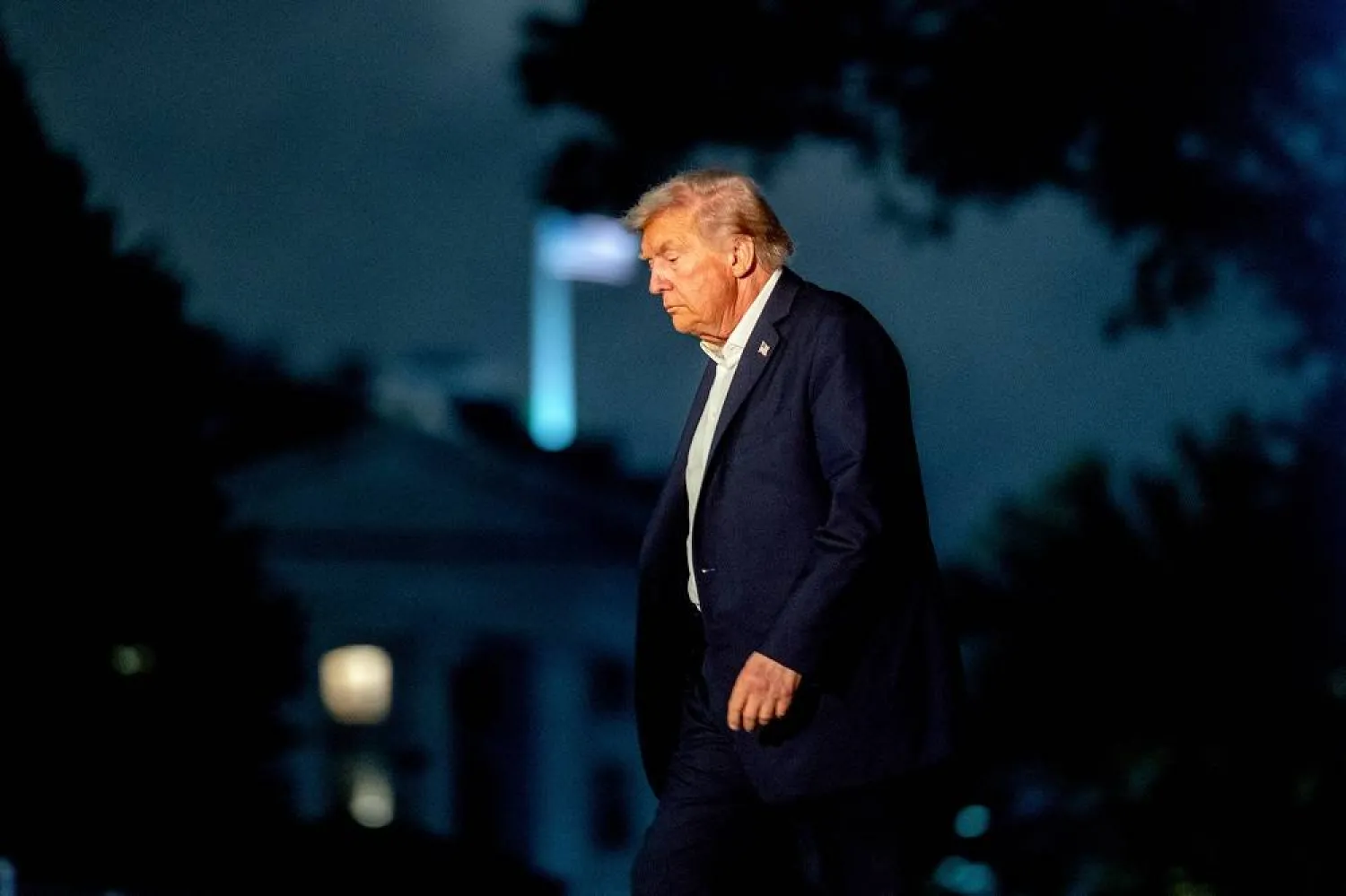 US President Donald Trump walks on the South Lawn of the White House after arriving on Marine One in Washington, DC, USA, 14 October 2025. (EPA) 