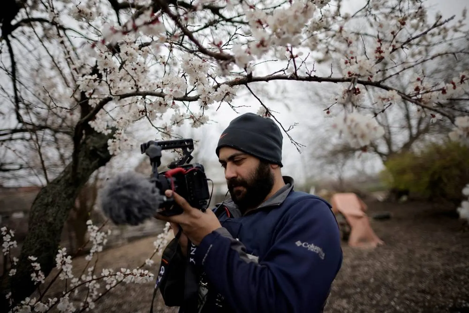 Reuters' journalist Issam Abdallah films Ukrainian woman Zhanna Lishchynska (not pictured) during an interview with Reuters, amid Russia's attack on Ukraine, in Zaporizhzhya, Ukraine April 17, 2022. (Reuters) 