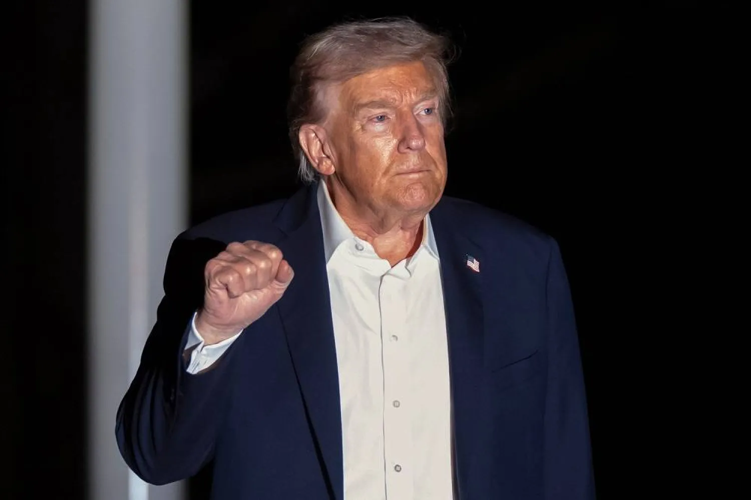 President Donald Trump walks across the South Lawn of the White House, early Tuesday, Oct. 14, 2025, in Washington, after returning from a trip to Israel and Egypt. (AP)