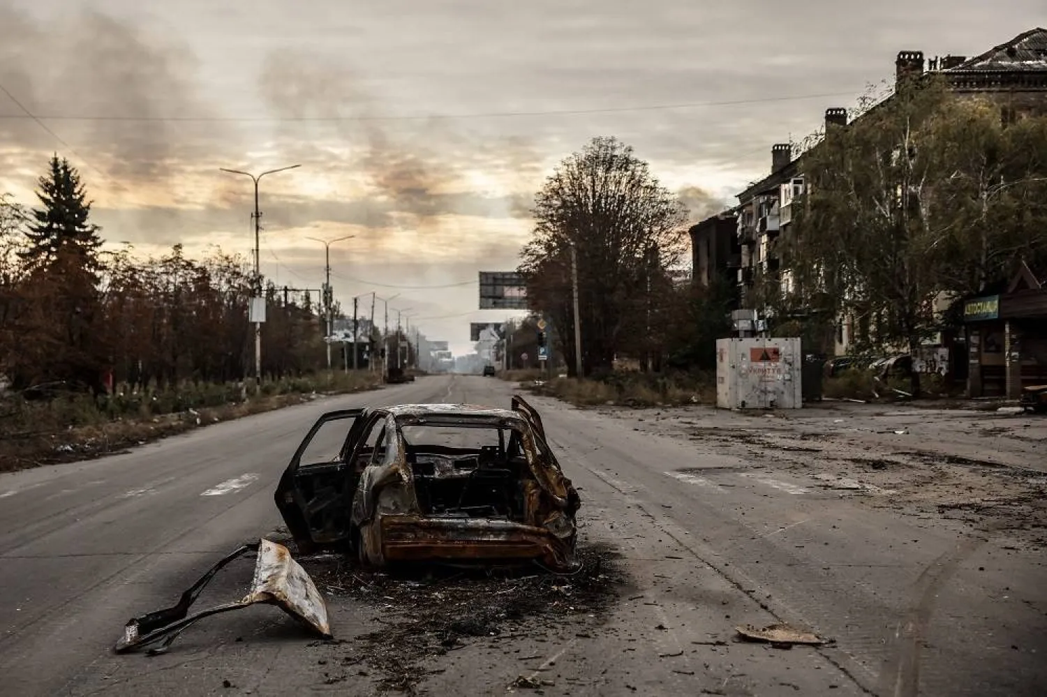 This handout photograph taken by the press service of the 24th Mechanized Brigade of Ukrainian Armed Forces on October 12, 2025 and released on October 14, 2025 shows a burnt-out car on a street in the frontline town of Kostyantynivka, Donetsk region, amid the Russian invasion of Ukraine. (Oleg Petrasiuk / 24th Mechanized Brigade of Ukrainian Armed Forces / AFP) 