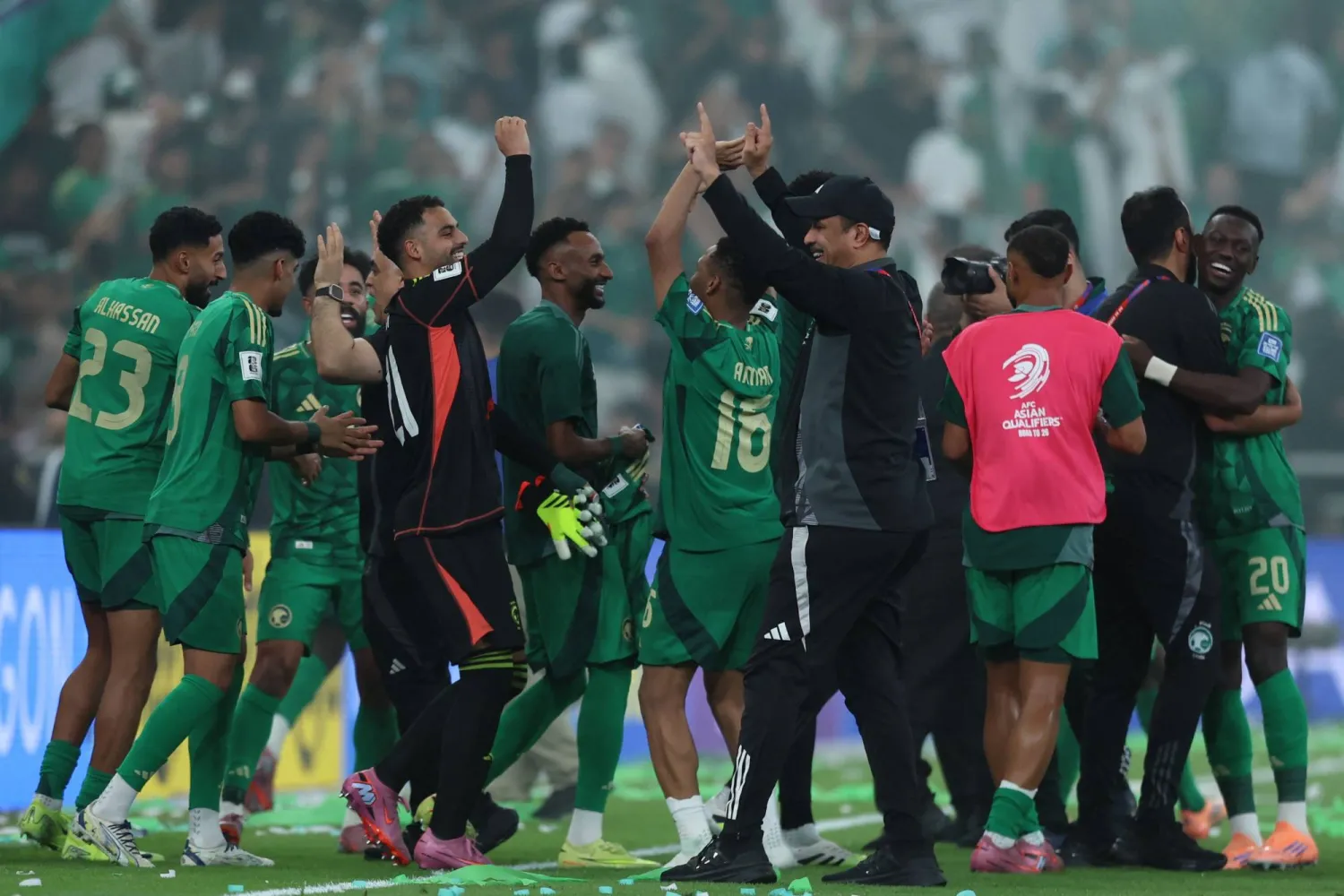 Saudi Arabia players celebrate after the FIFA World Cup 2026 Asian qualifier football match between Saudi Arabia and Iraq at King Abdullah Sports City in Jeddah on October 14, 2025. (Photo by AFP)