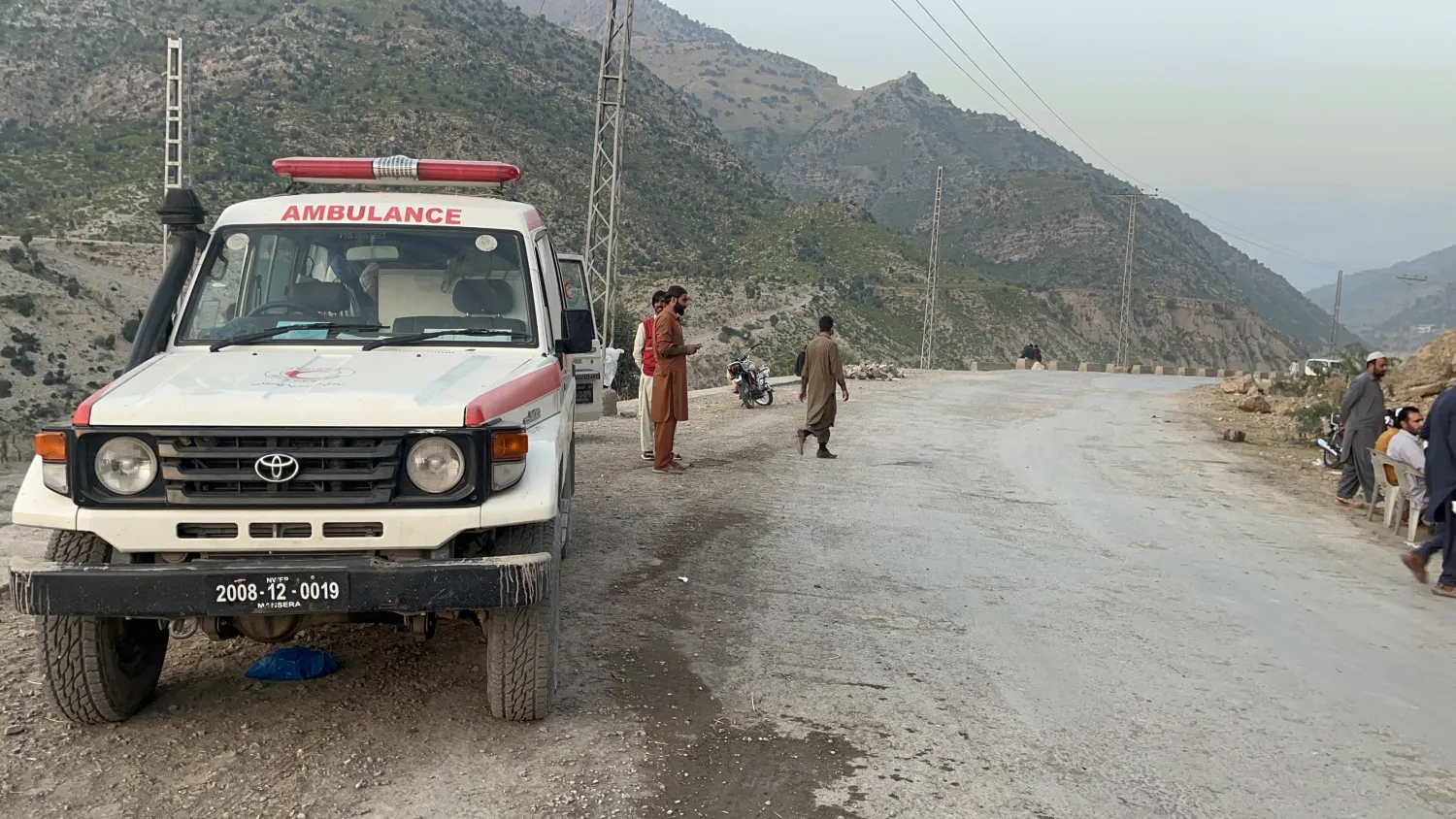 Volunteers stand on a road near the Pak-Afghan border in Kurram, Pakistan, 16 October 2025. EPA/BASIT GILANI
