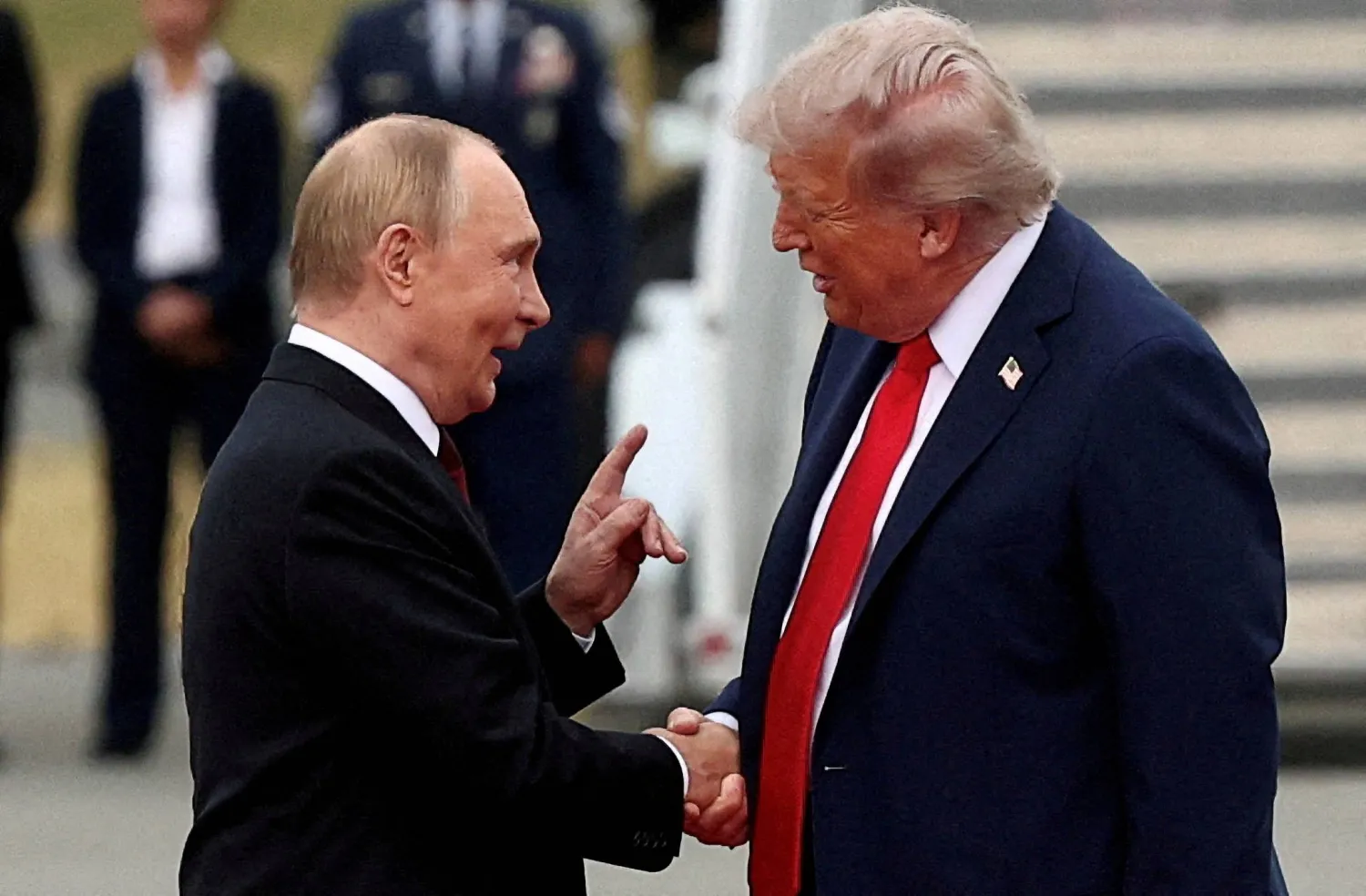 US President Donald Trump shakes hand with Russian President Vladimir Putin, as they meet to negotiate for an end to the war in Ukraine, at Joint Base Elmendorf-Richardson in Anchorage, Alaska, US, August 15, 2025. (Reuters)