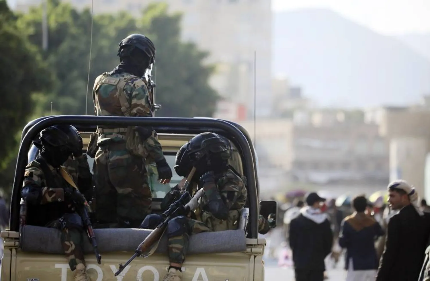 Houthi militants ride a vehicle while on patrol at a street in Sanaa, Yemen, 17 October 2025. (EPA)