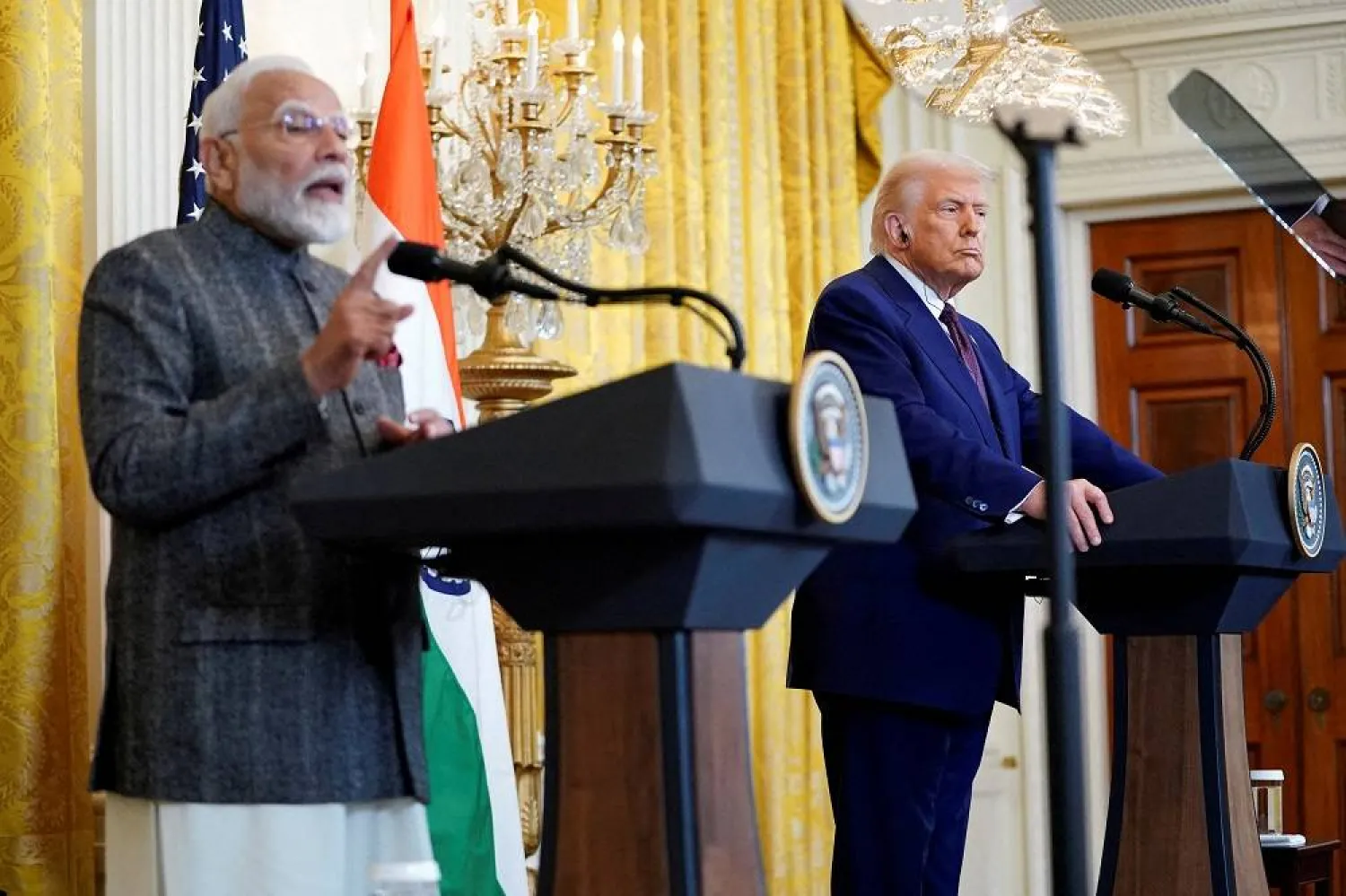 US President Donald Trump listens as Indian Prime Minister Narendra Modi speaks during a joint press conference at the White House in Washington, DC, US, February 13, 2025. (Reuters)