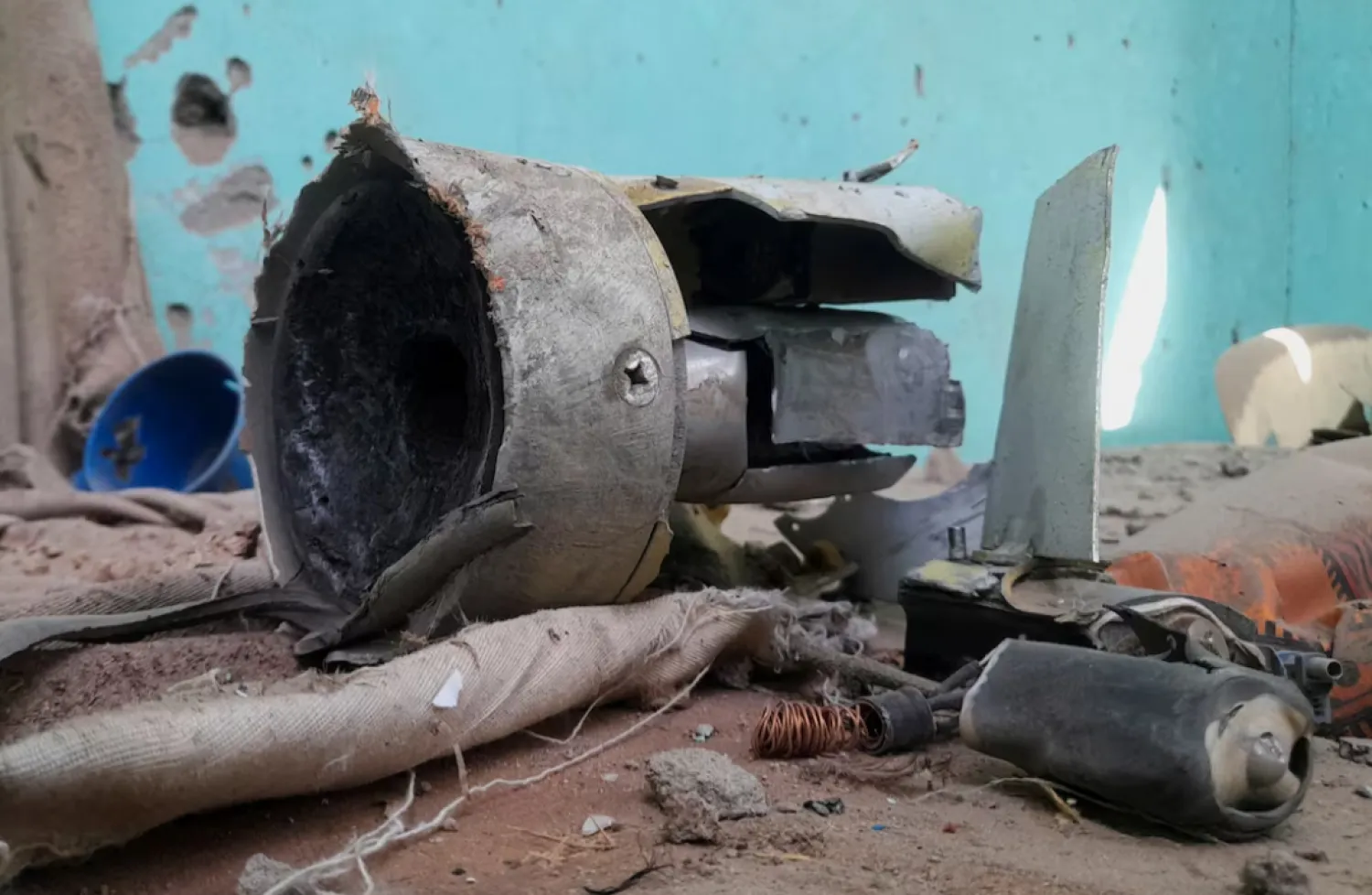 Remnants of a shell that targeted the refugee center, in El Fasher, Sudan, October 7, 2025. REUTERS/Mohyaldeen M Abdallah 