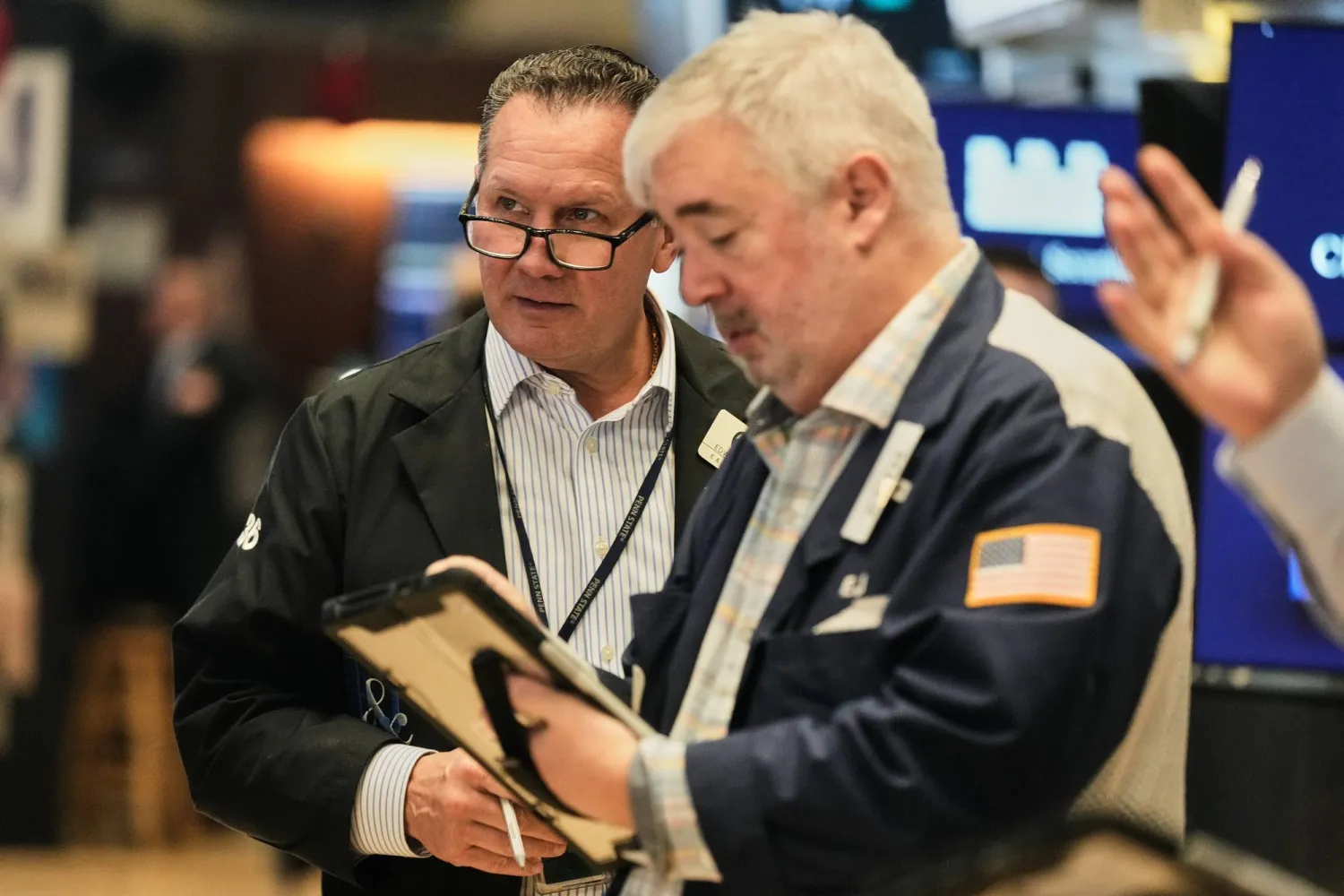 متداولون يعملون في بورصة نيويورك (أ.ب)