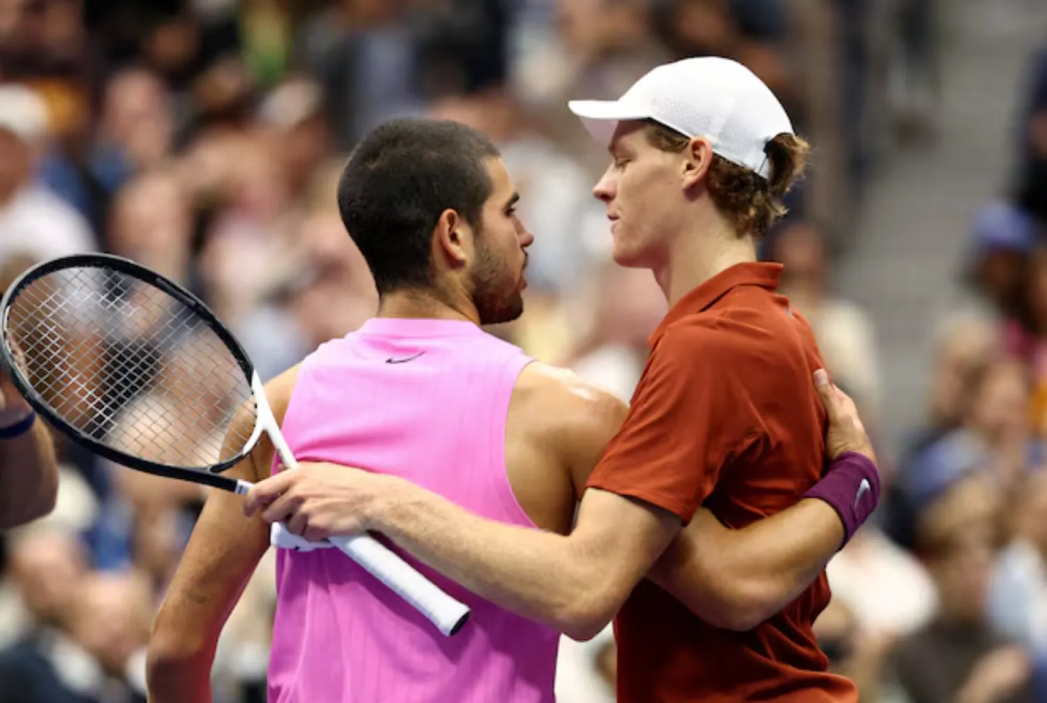 Tennis - US Open - Flushing Meadows, New York, United States - September 7, 2025 Spain's Carlos Alcaraz hugs Italy's Jannik Sinner after winning the men's singles final REUTERS/Kevin Lamarque TPX IMAGES OF THE DAY 