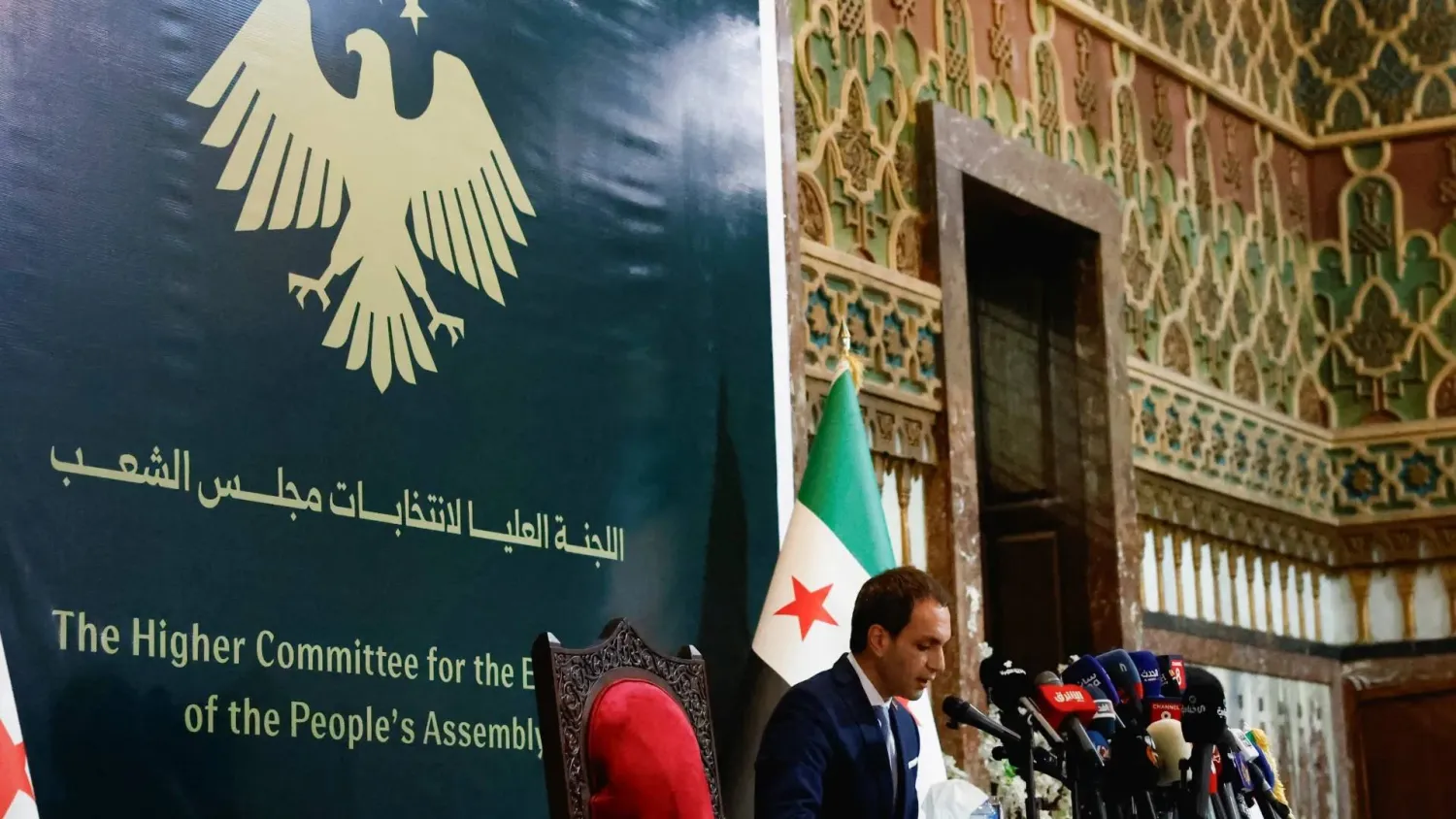 Nawar Najmeh, spokesperson of the Syria's Higher Committee for People's Assembly Elections, announces the results of the Syrian parliamentary elections, in Damascus, Syria, on October 6, 2025. (Reuters)