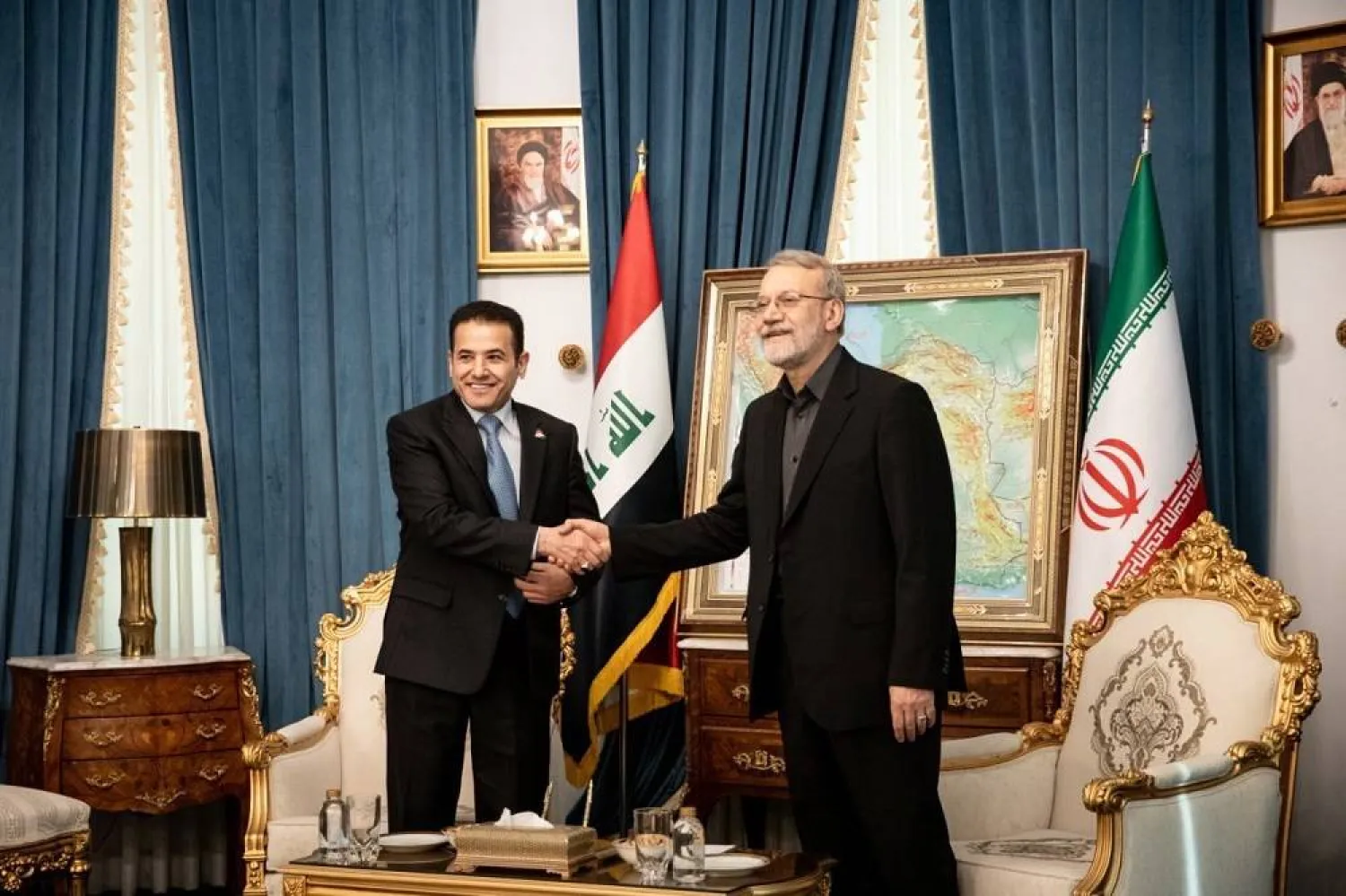 A handout photo made available by the Iranian State TV (IRIB) official website shows Iran’s Supreme National Security Council (SNSC) Secretary Ali Larijani and Iraqi National Security Adviser Qasim al-Araji prior to their meeting in Tehran, Iran, 20 October 2025. (EPA/IRIB/Handout) 