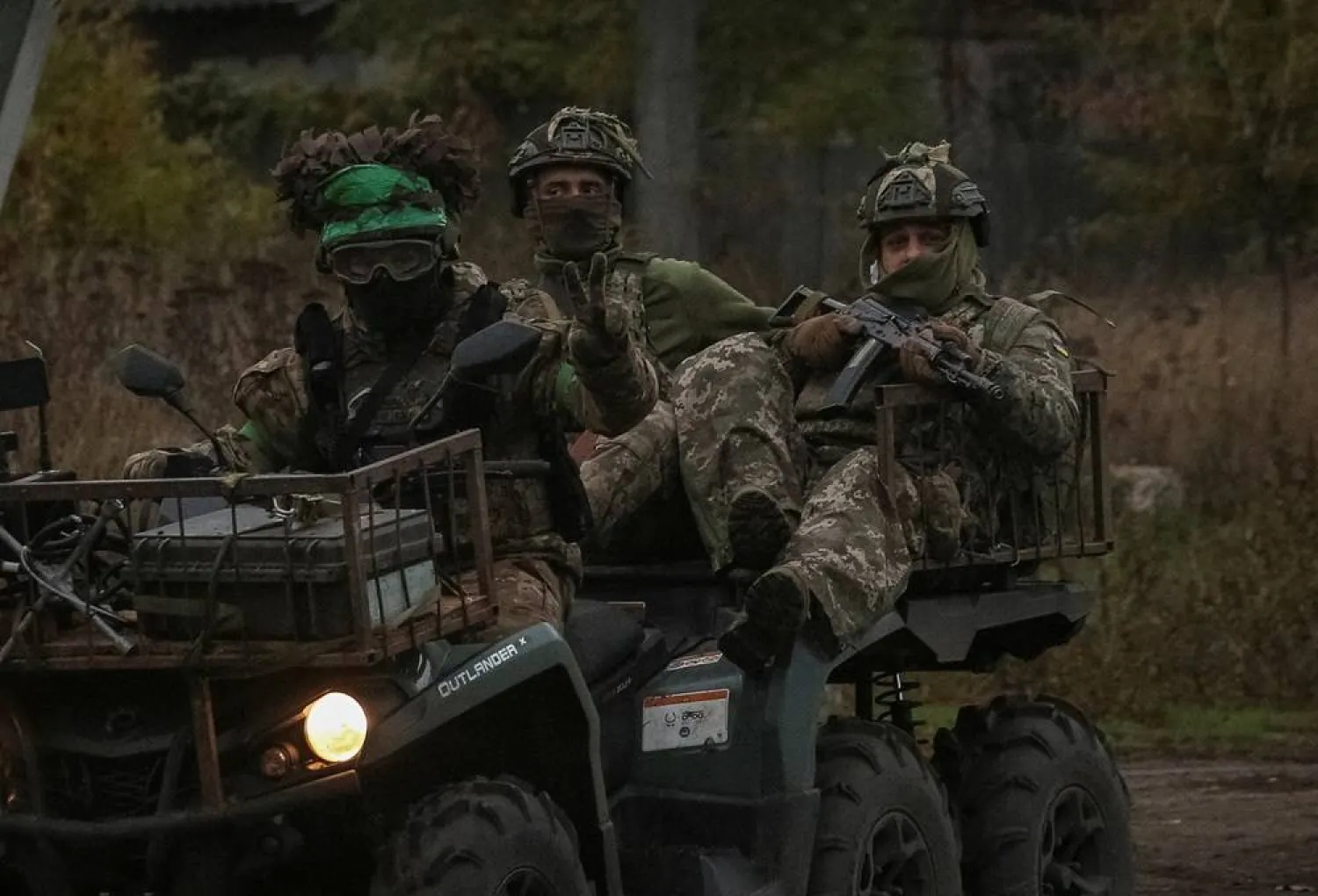  Ukrainian servicemen ride a military buggy, amid Russia's attack on Ukraine, in the Donetsk region, Ukraine, October 21, 2025. (Reuters)